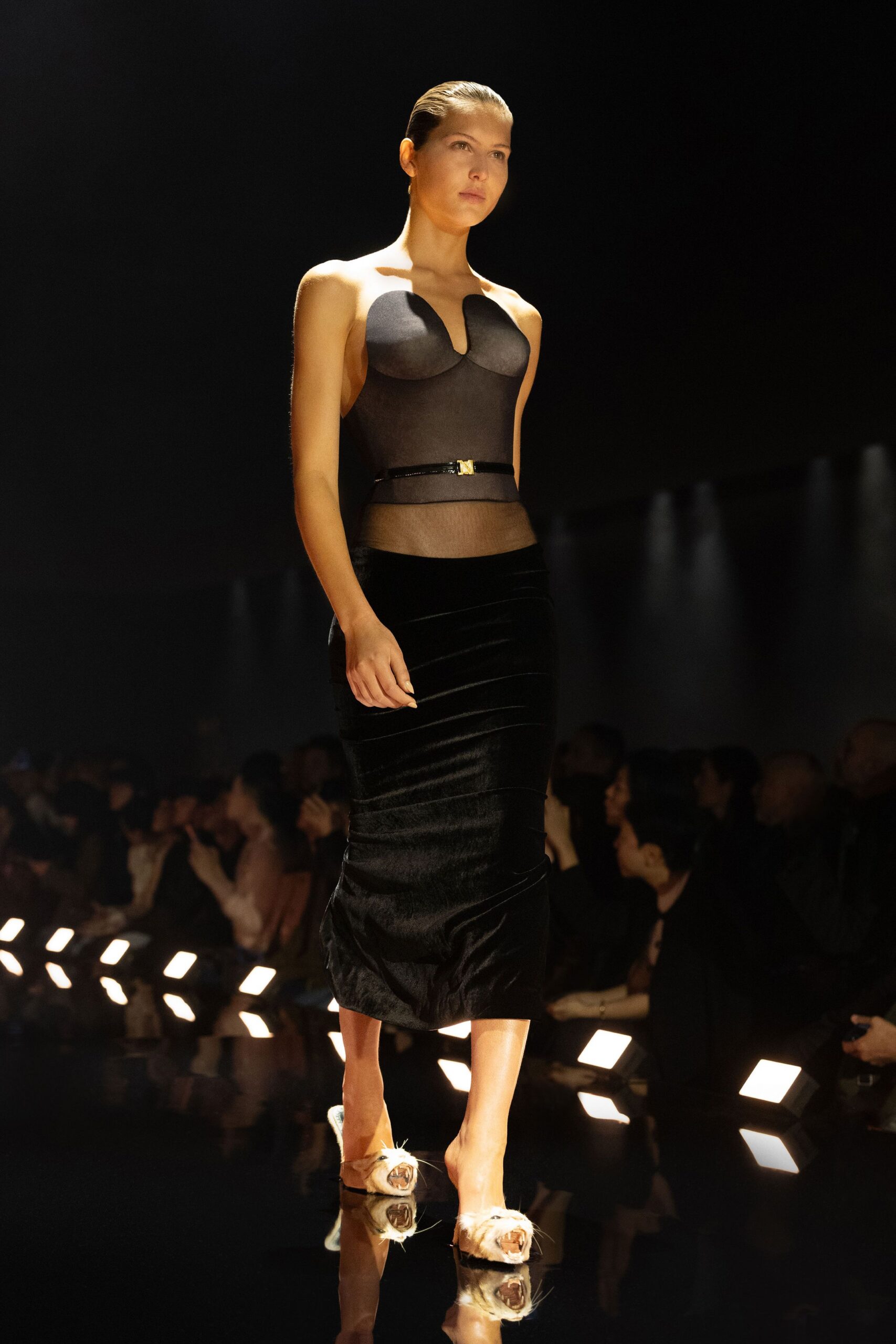 black fitted top and midi skirt