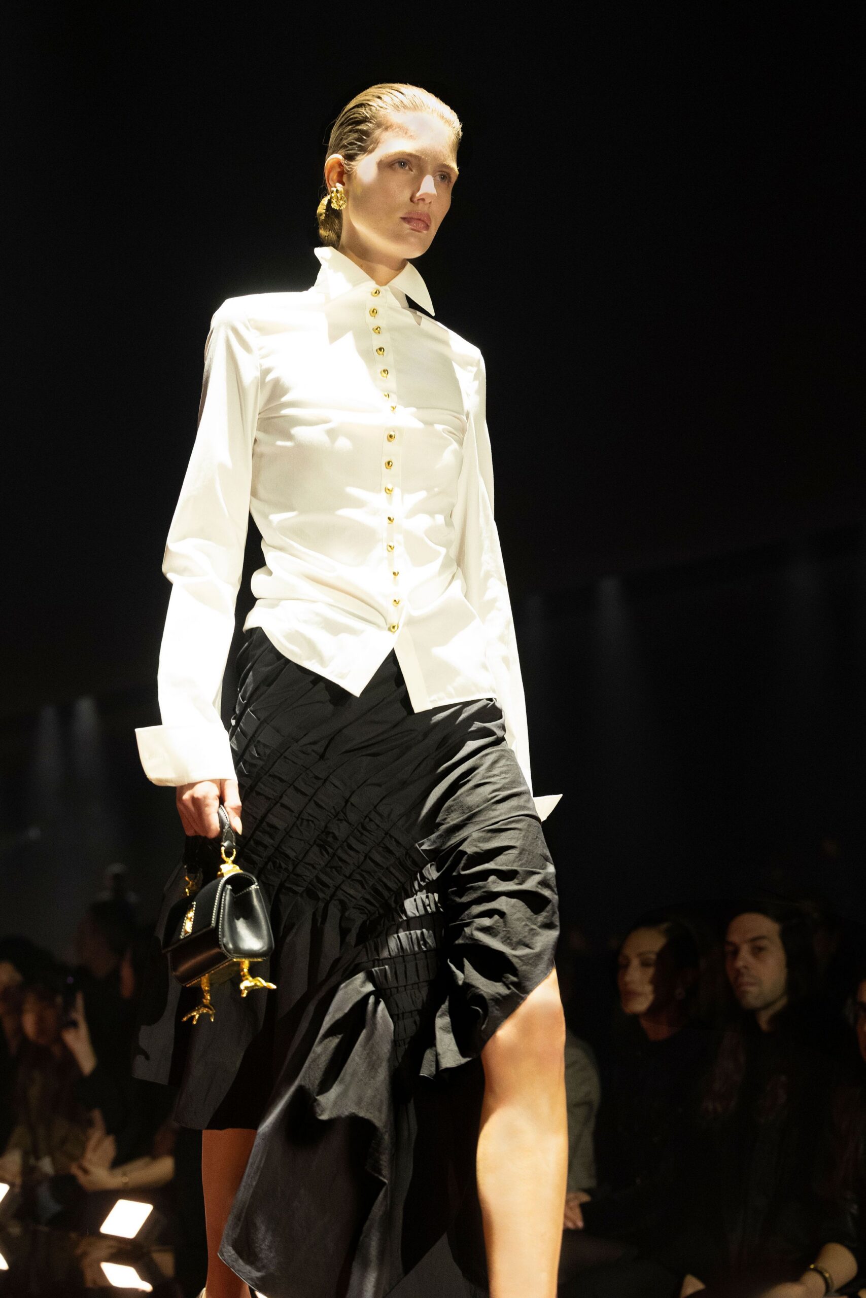 white fitted shirt black pleated skirt