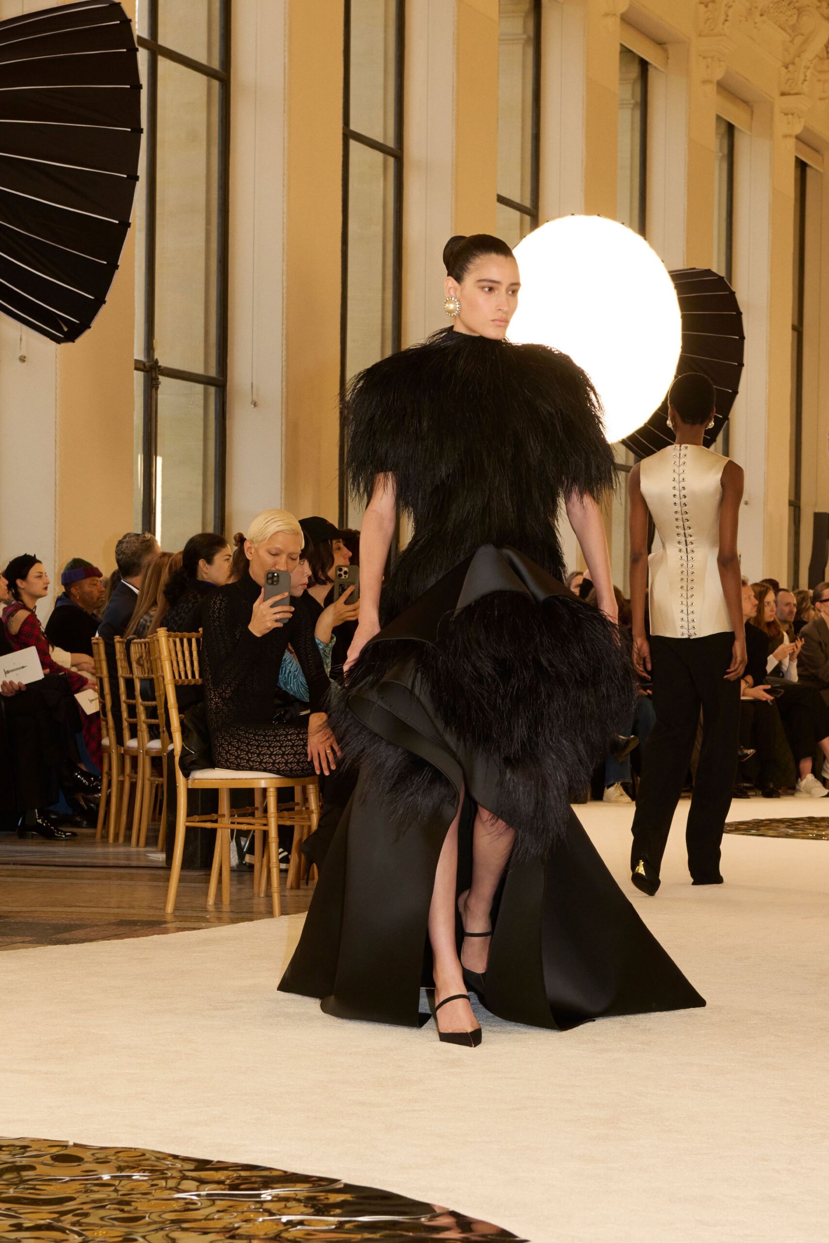 black fur sleeveless high-neck fitted ruffled layered gown