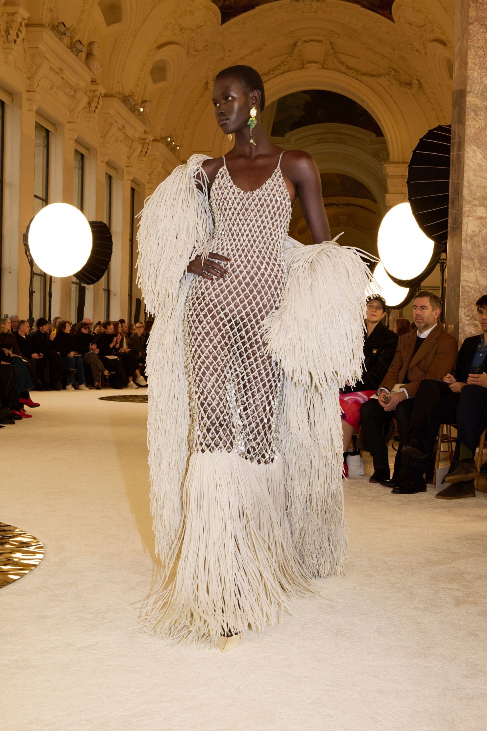 white fringed gown with coat