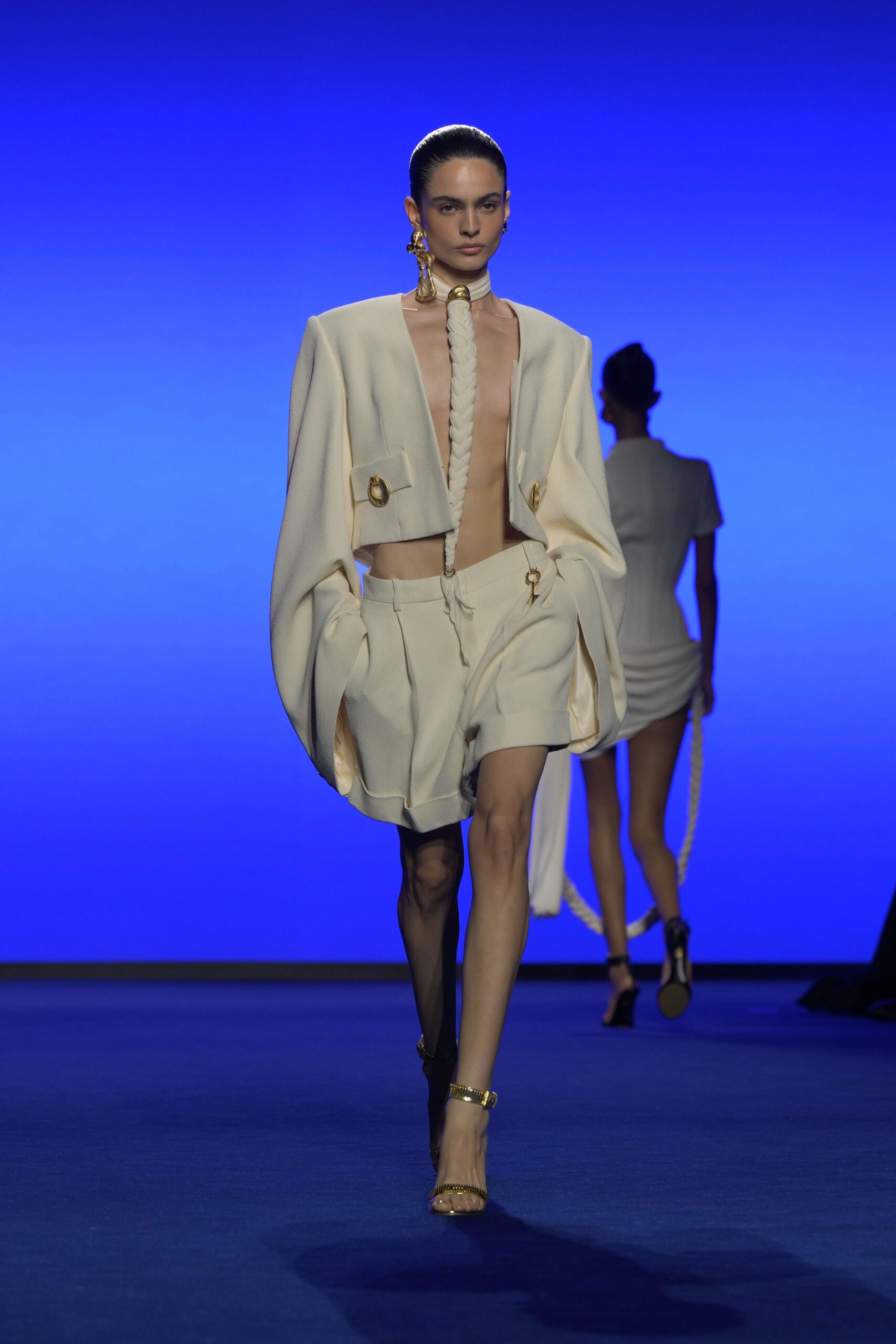 beige fitted jacket and shorts