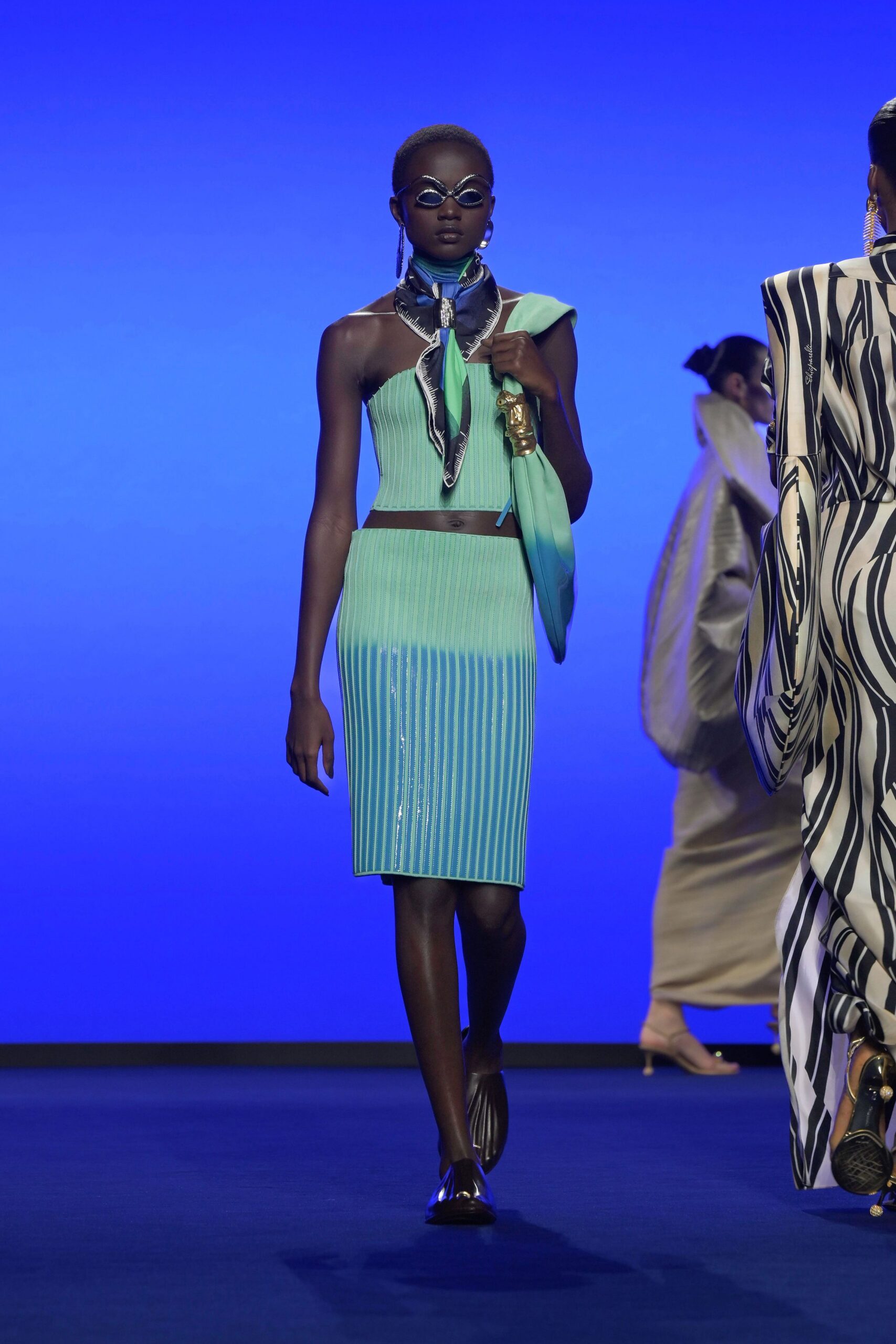 blue green fitted top and skirt