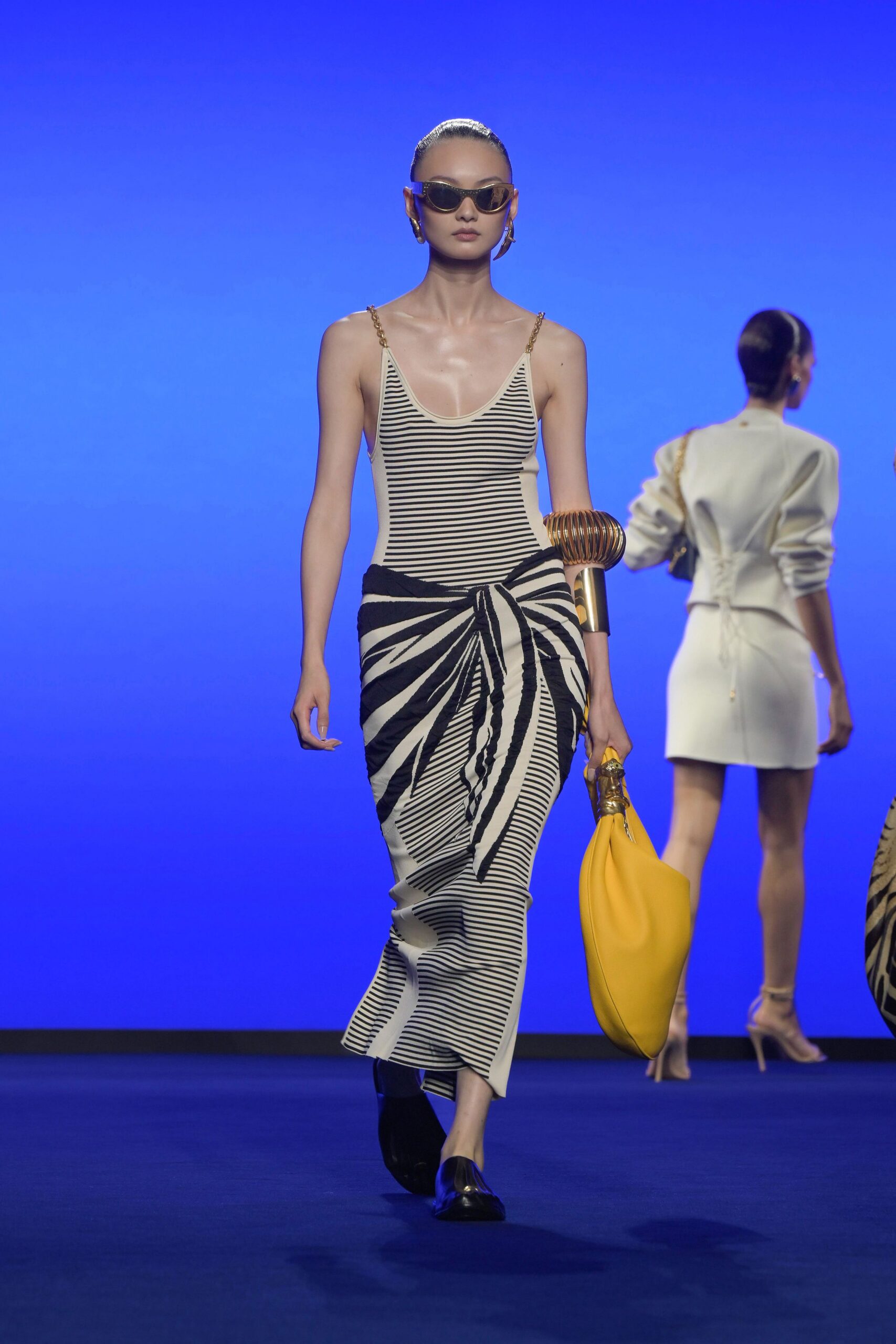 striped fitted midi dress with yellow bag