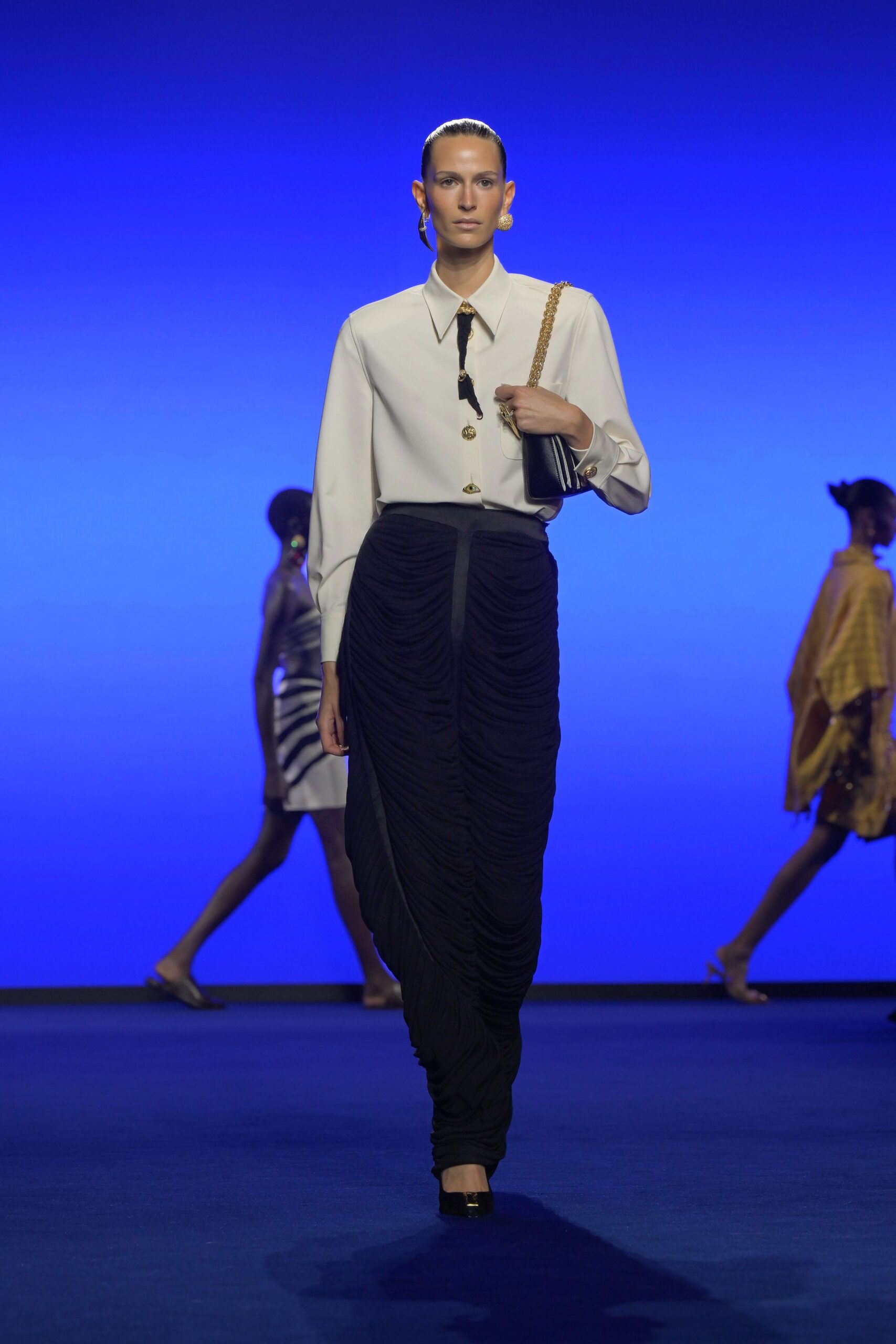 white fitted shirt with black skirt