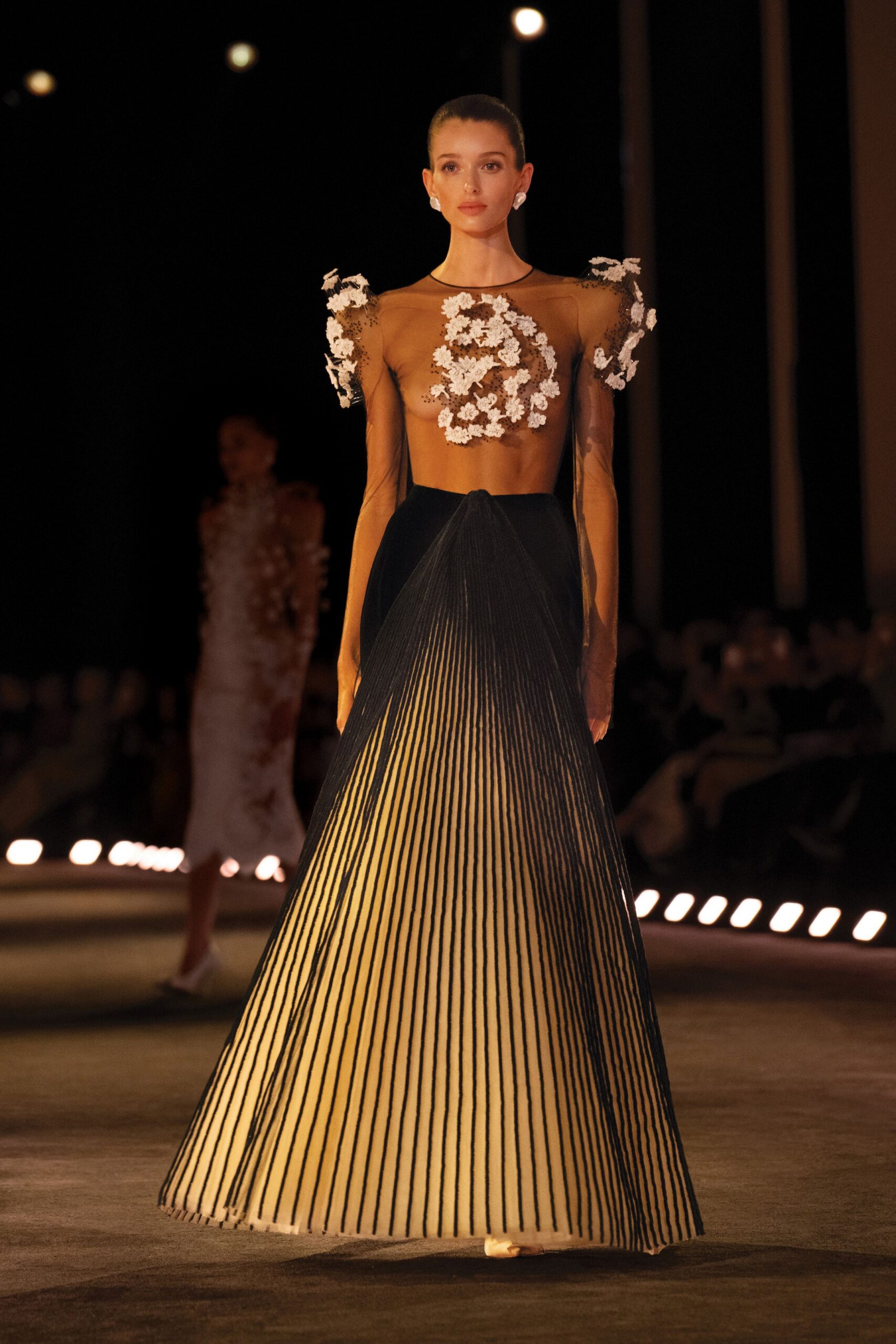 black and beige pleated gown