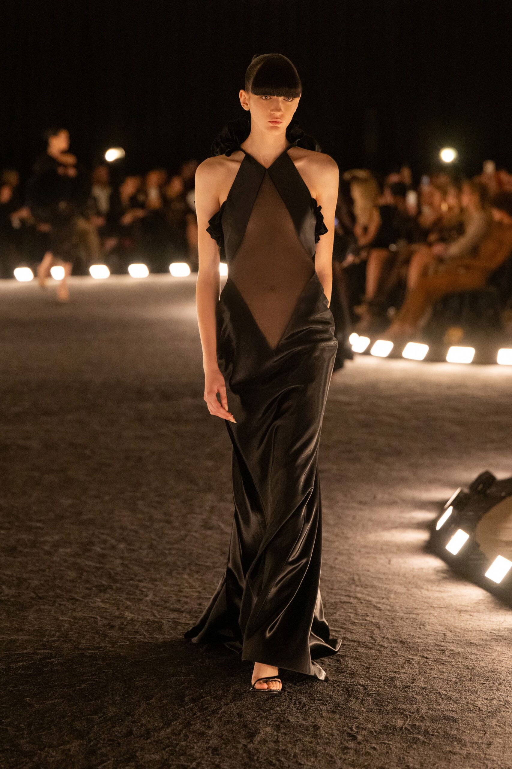 black silk sleeveless v-neck fitted ruffled sheer gown