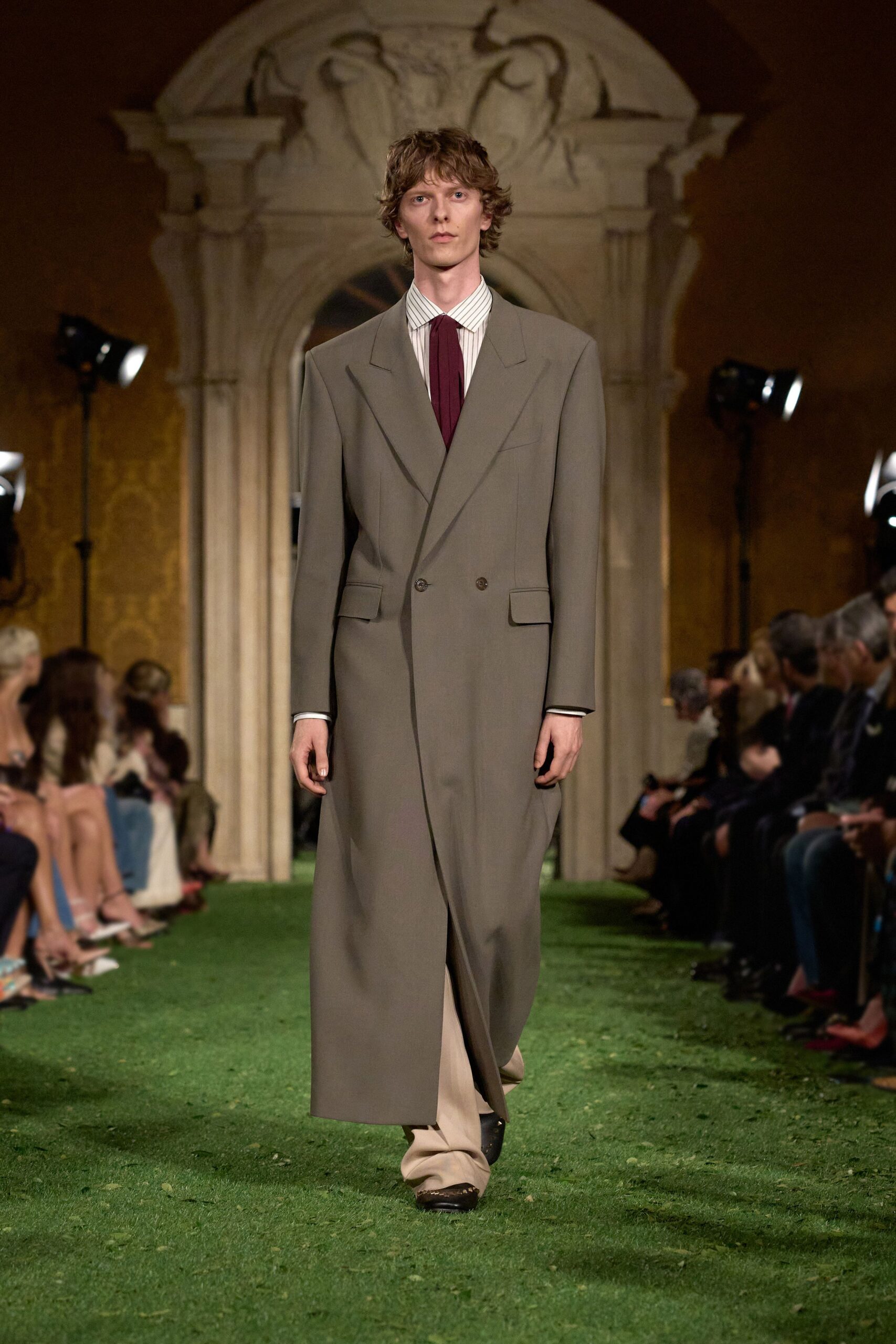 beige wool coat with shirt and tie