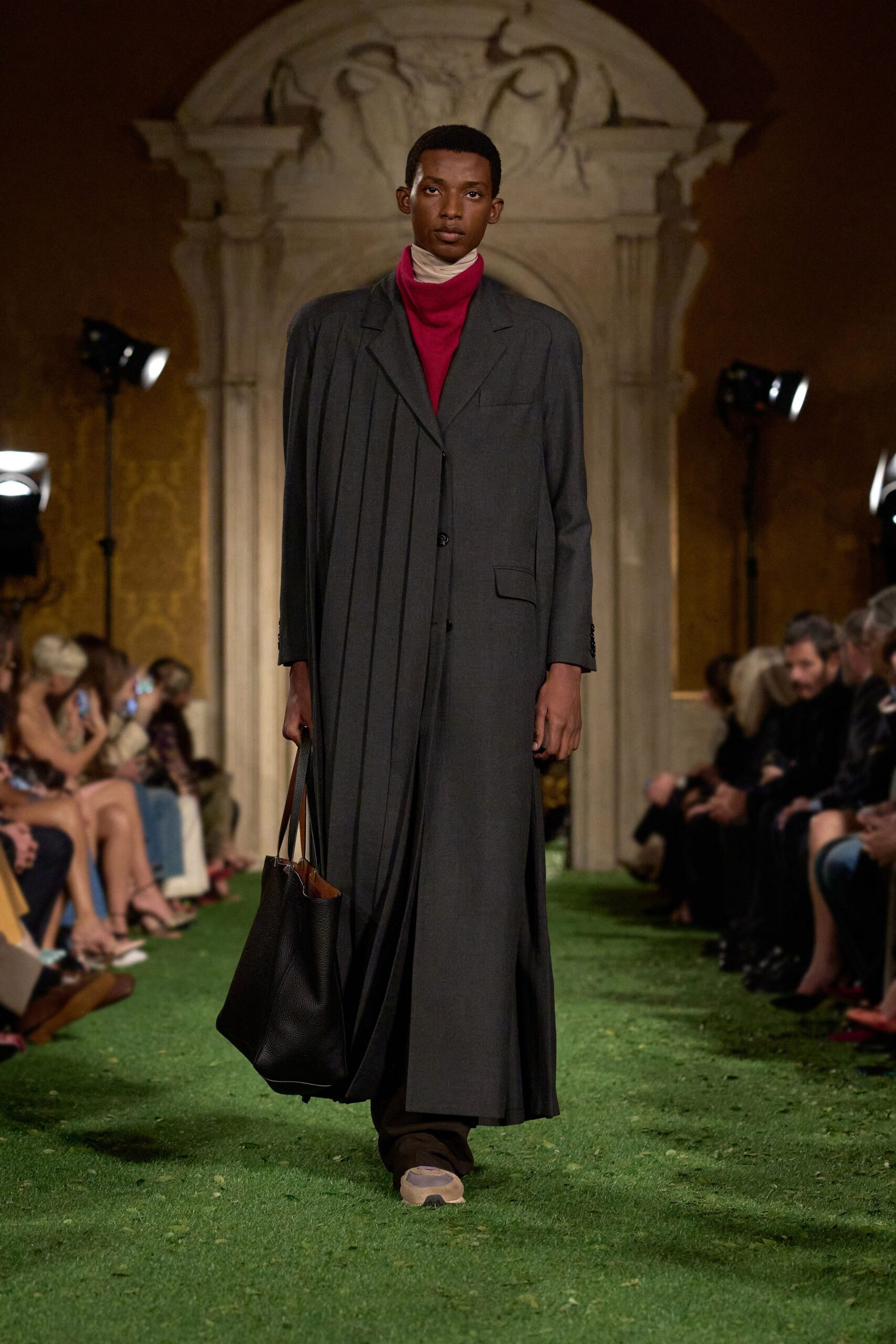 gray pleated coat with red top