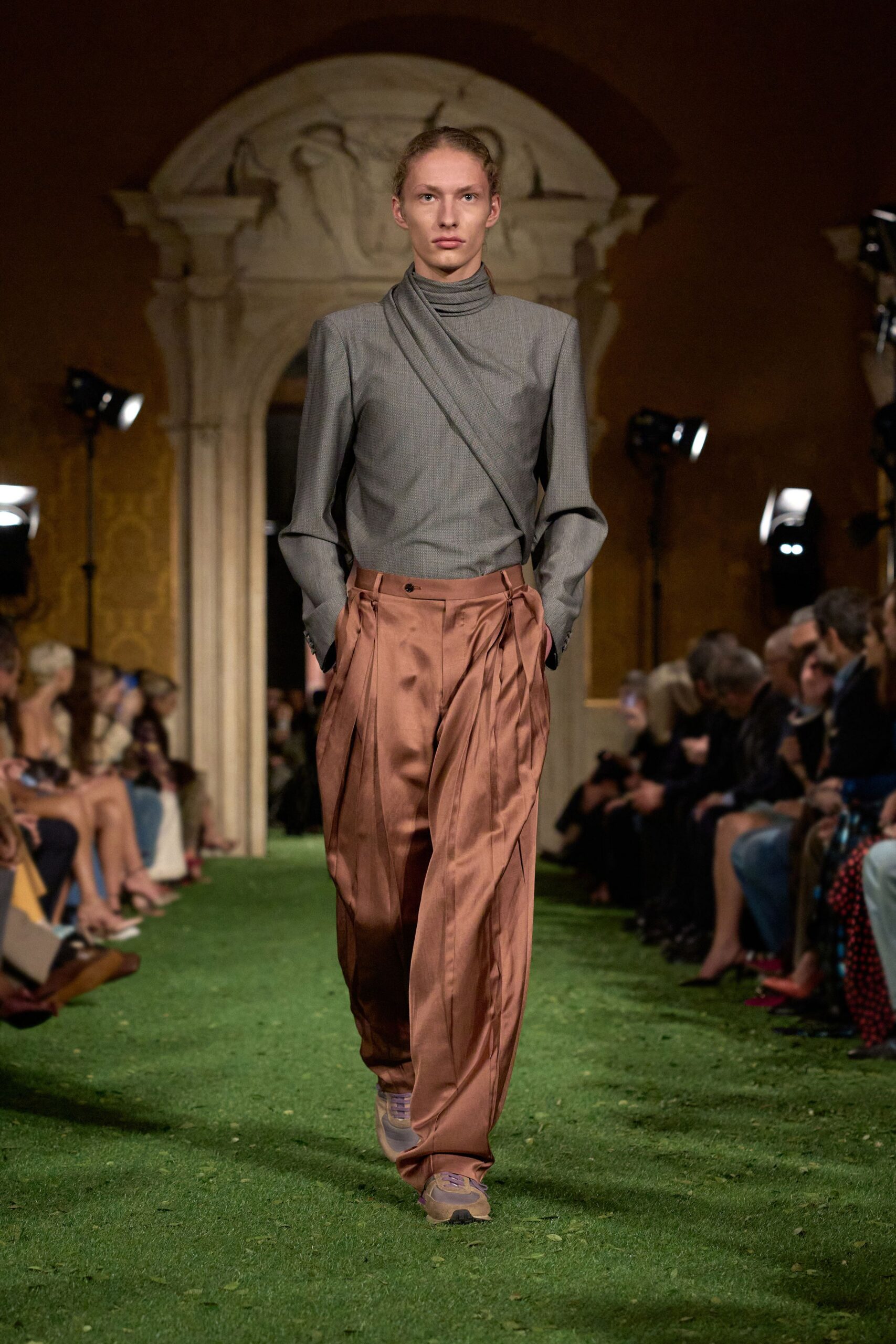 gray fitted top with brown pants