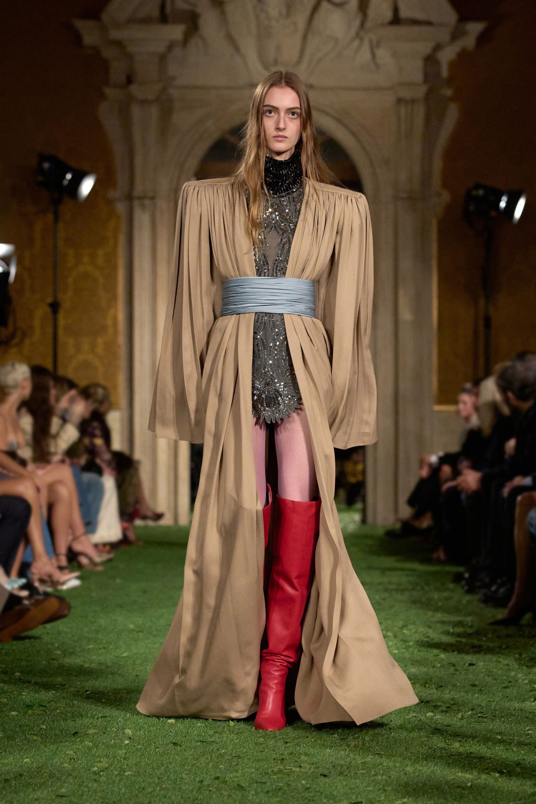 beige mini dress with red boots