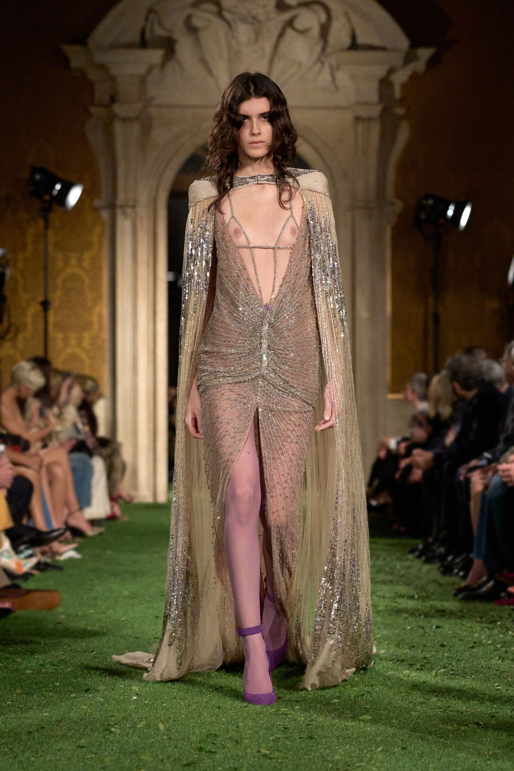 gold sequined gown with slit