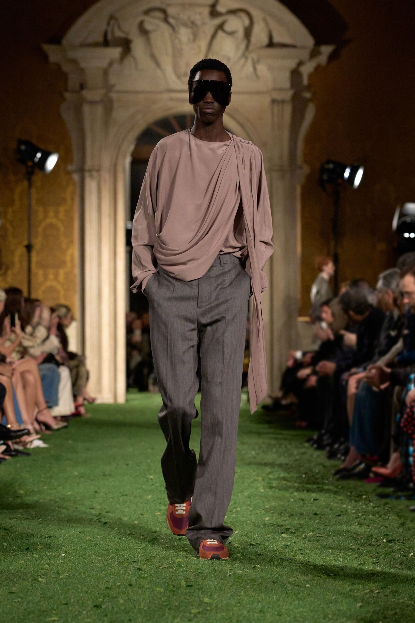 pink relaxed top with gray tailored pants
