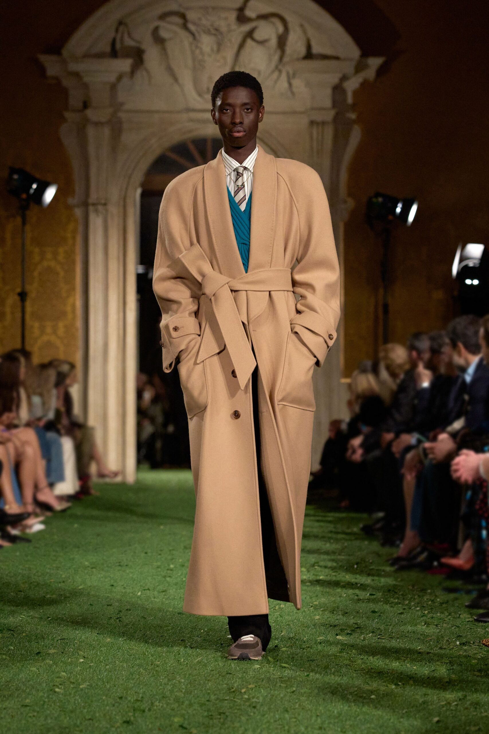 beige wool coat with blue vest