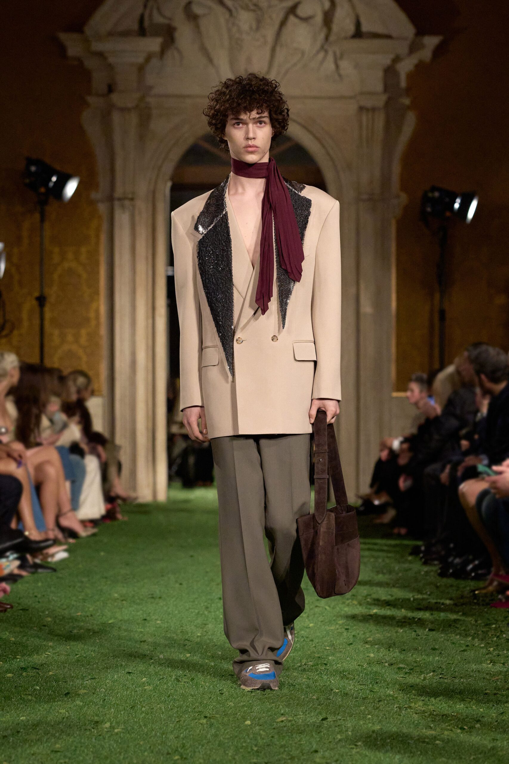 beige blazer gray pants red scarf