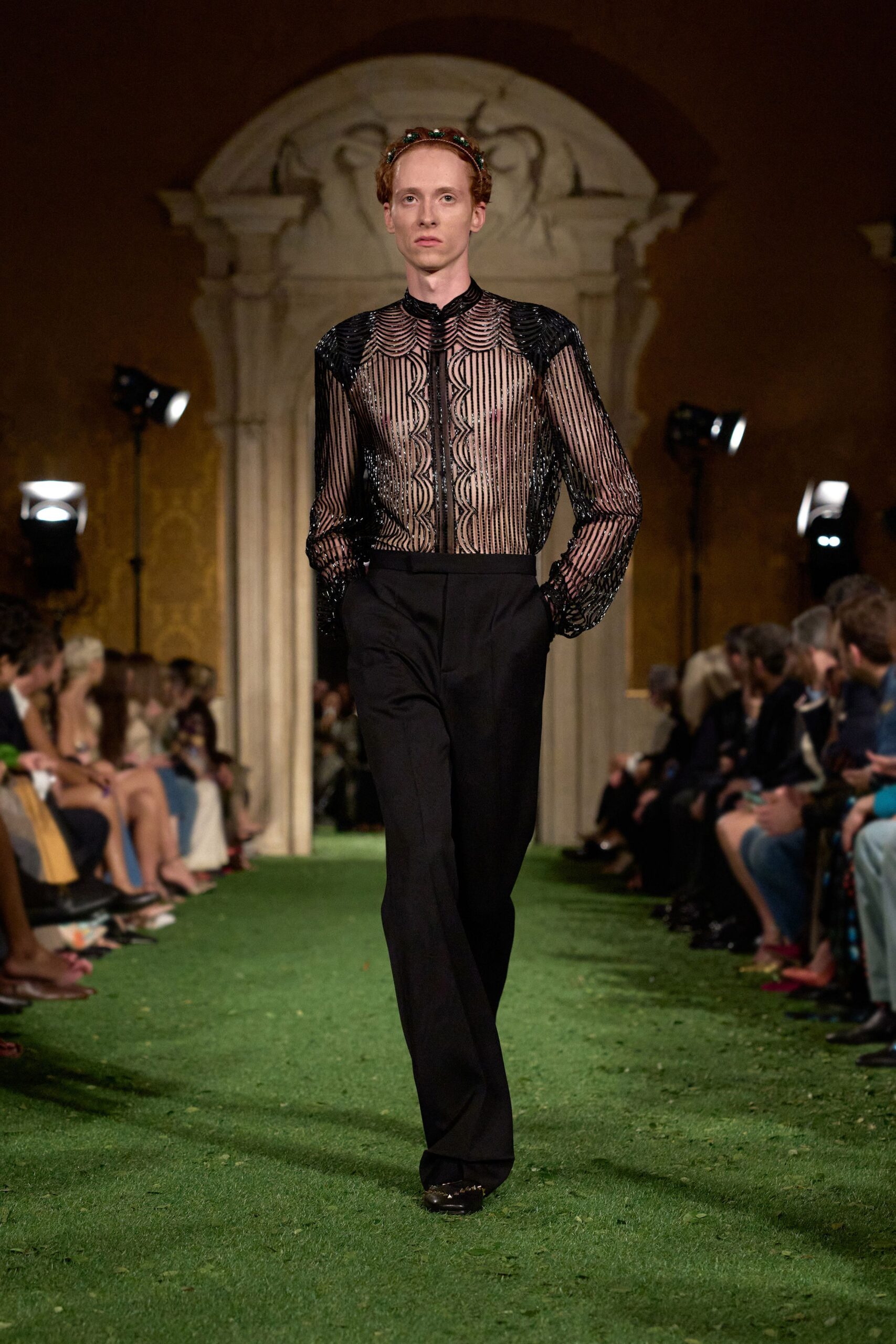 black lace shirt with tailored pants