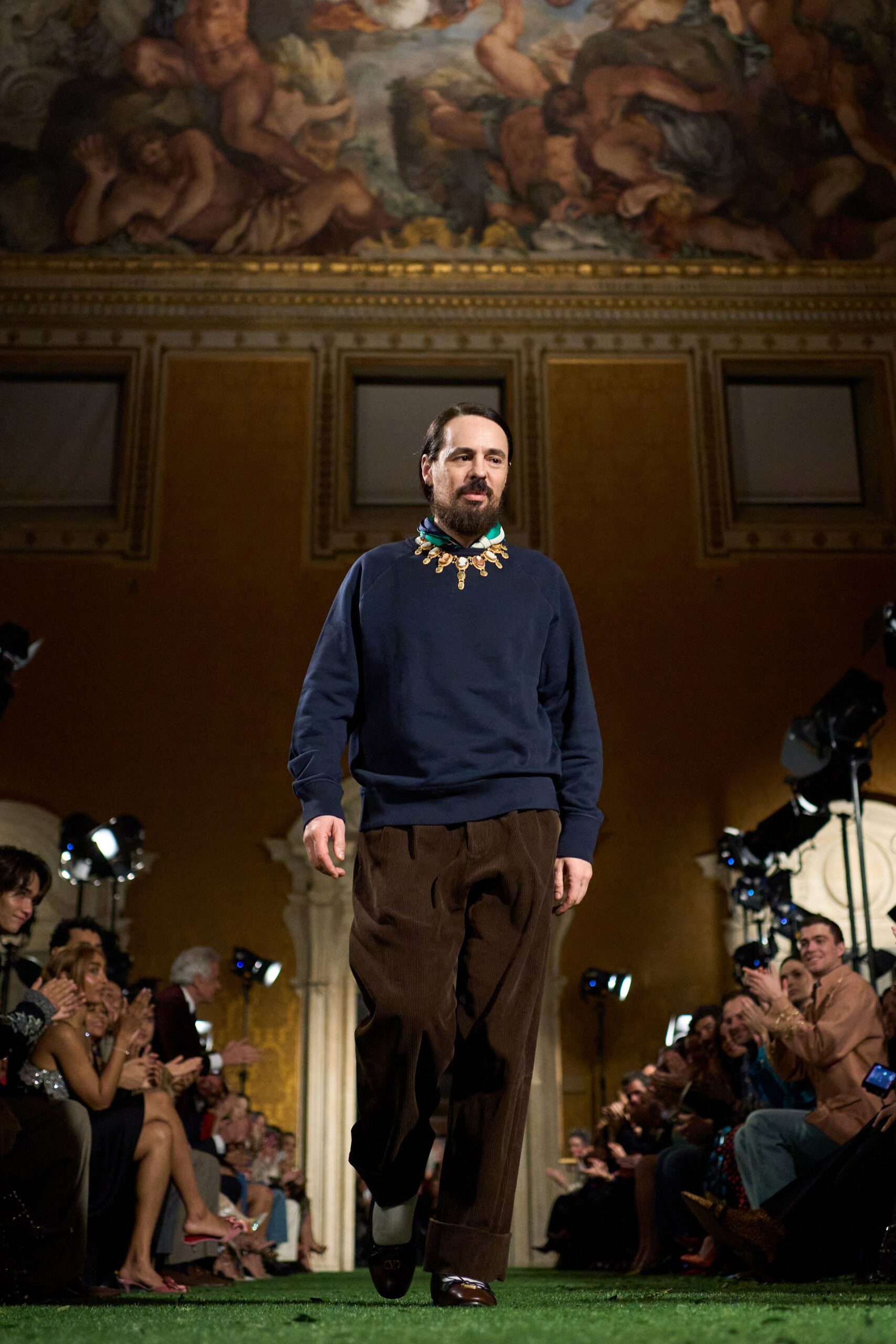 blue relaxed sweater with brown pants