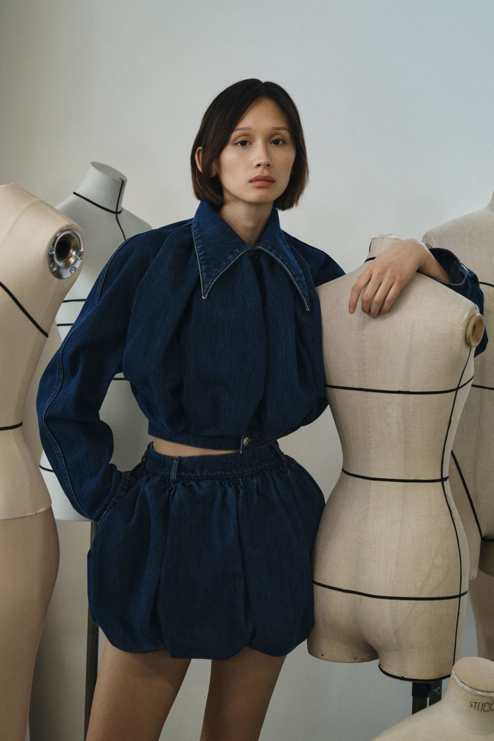 blue denim long-sleeve collared relaxed pleated top