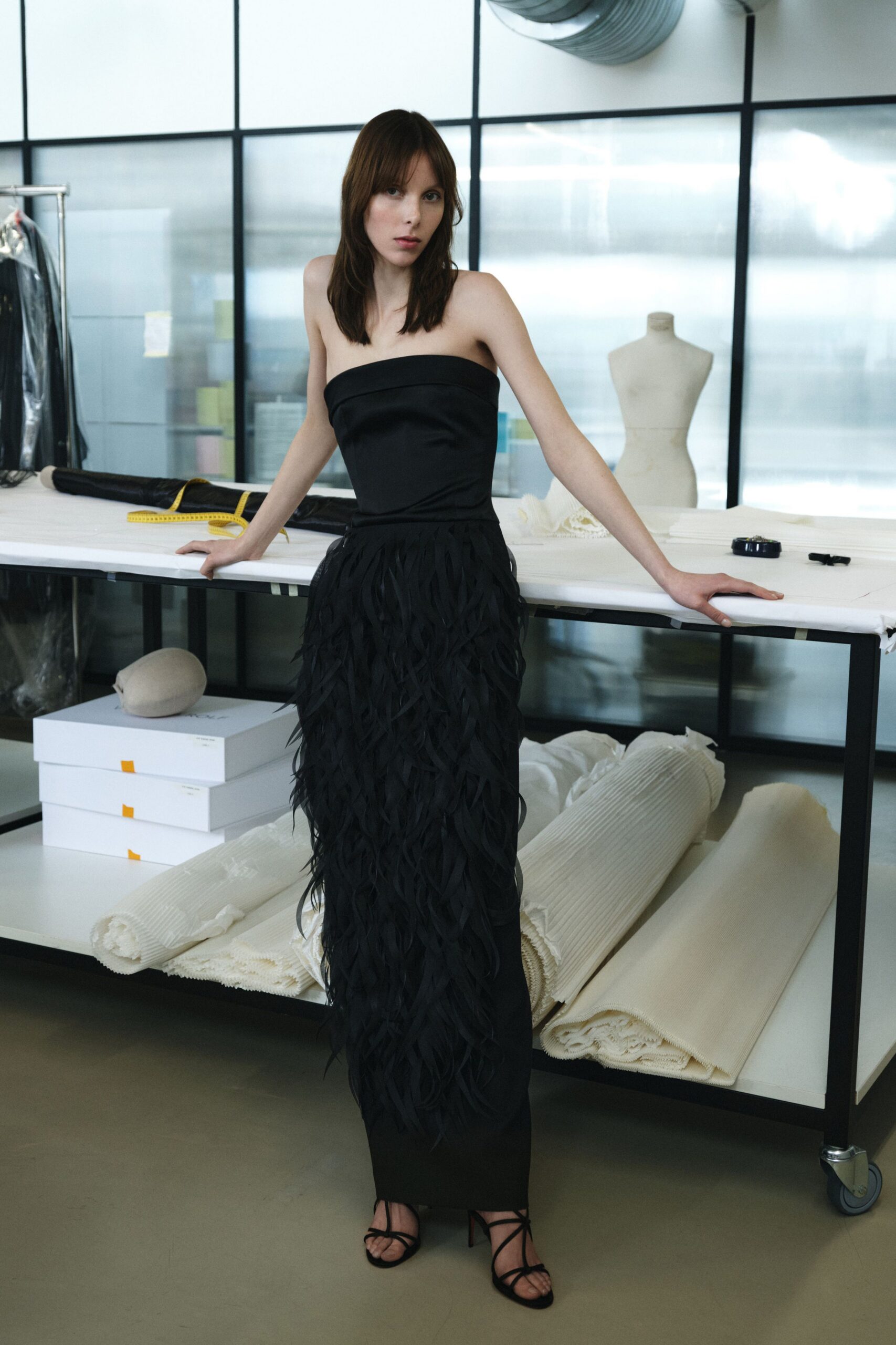 black strapless fringed gown