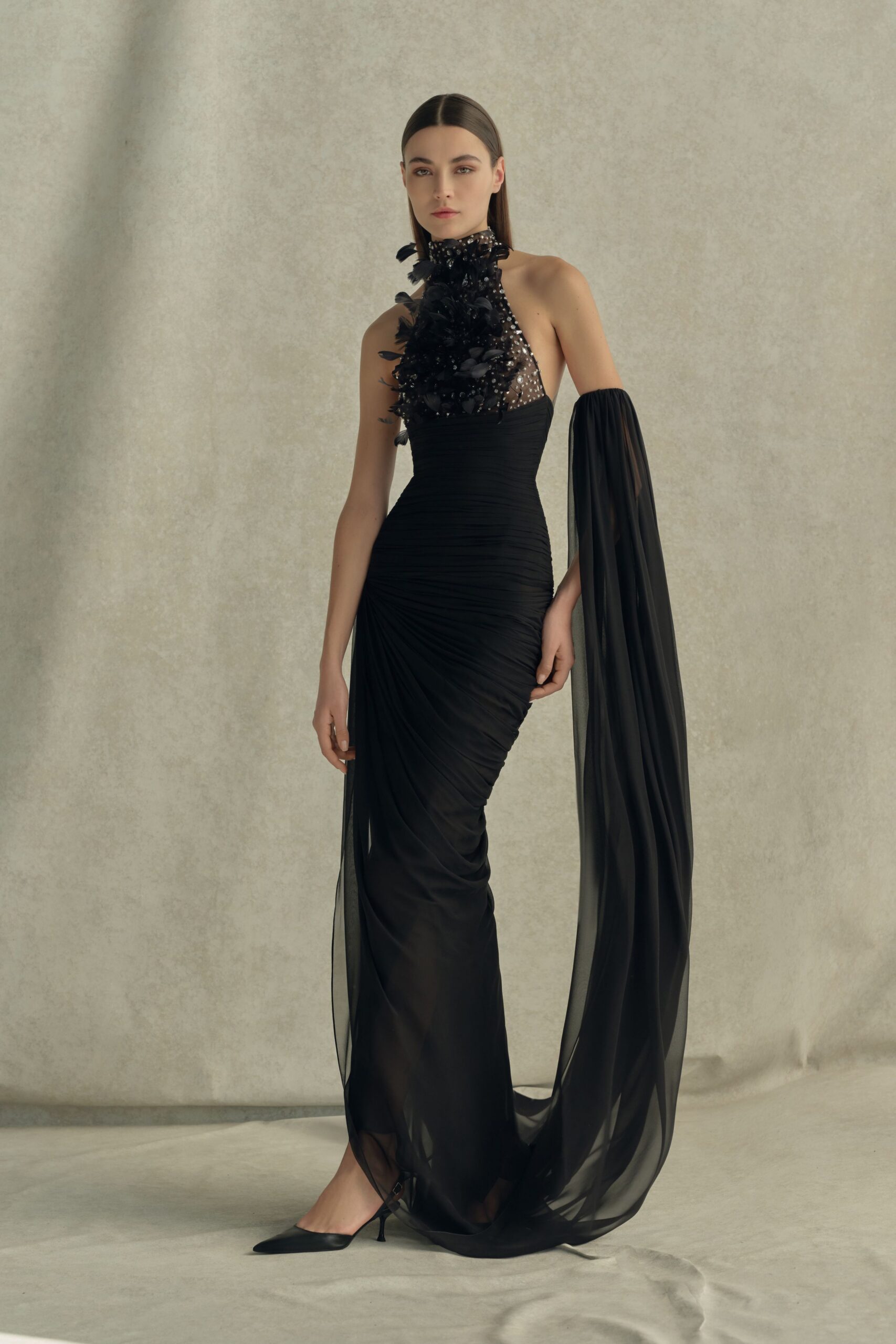 black silk sleeveless high-neck fitted ruched embellished gown