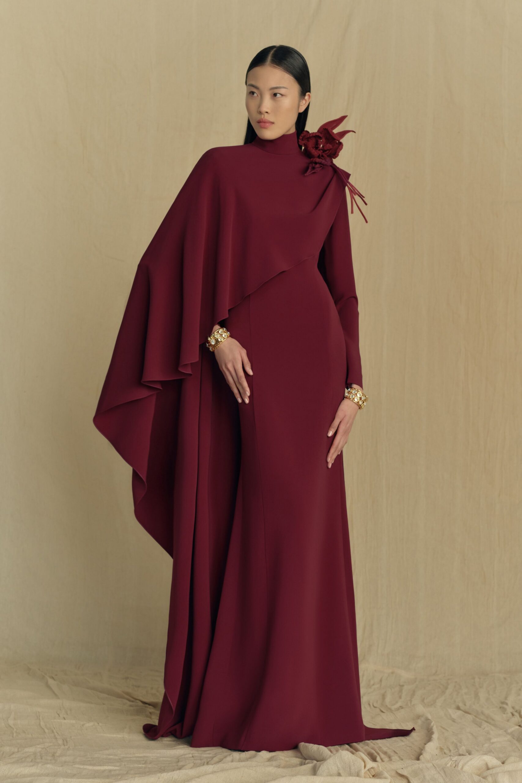 red silk long-sleeve gown