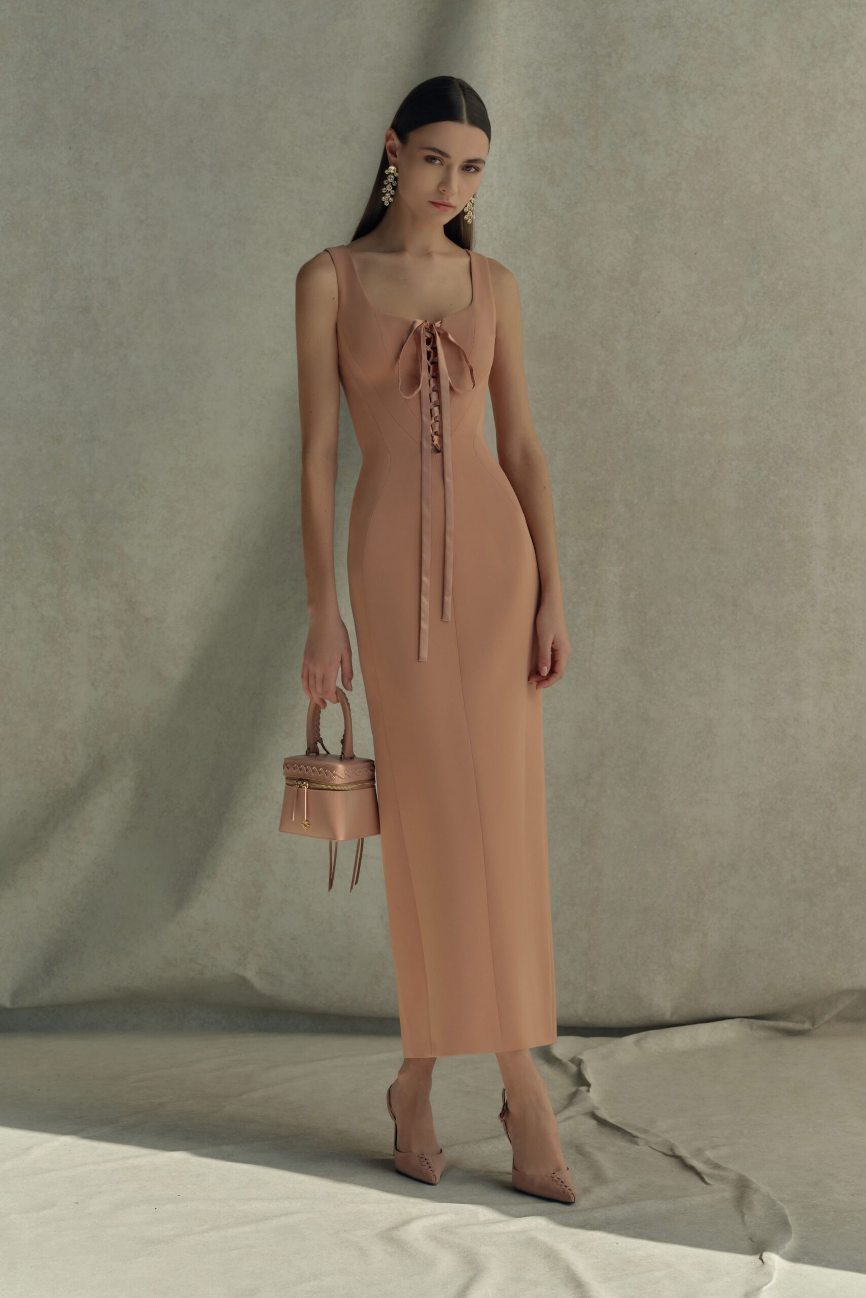 beige neoprene sleeveless v-neck fitted ruched midi dress