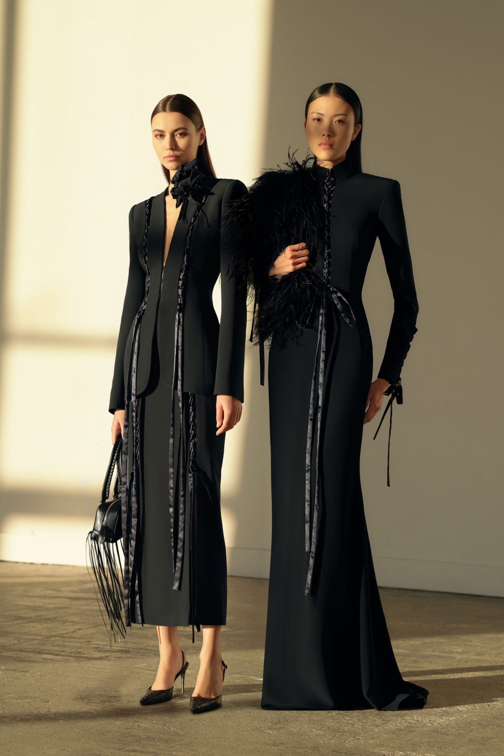 black silk long-sleeve high-neck fitted draped fringed gown