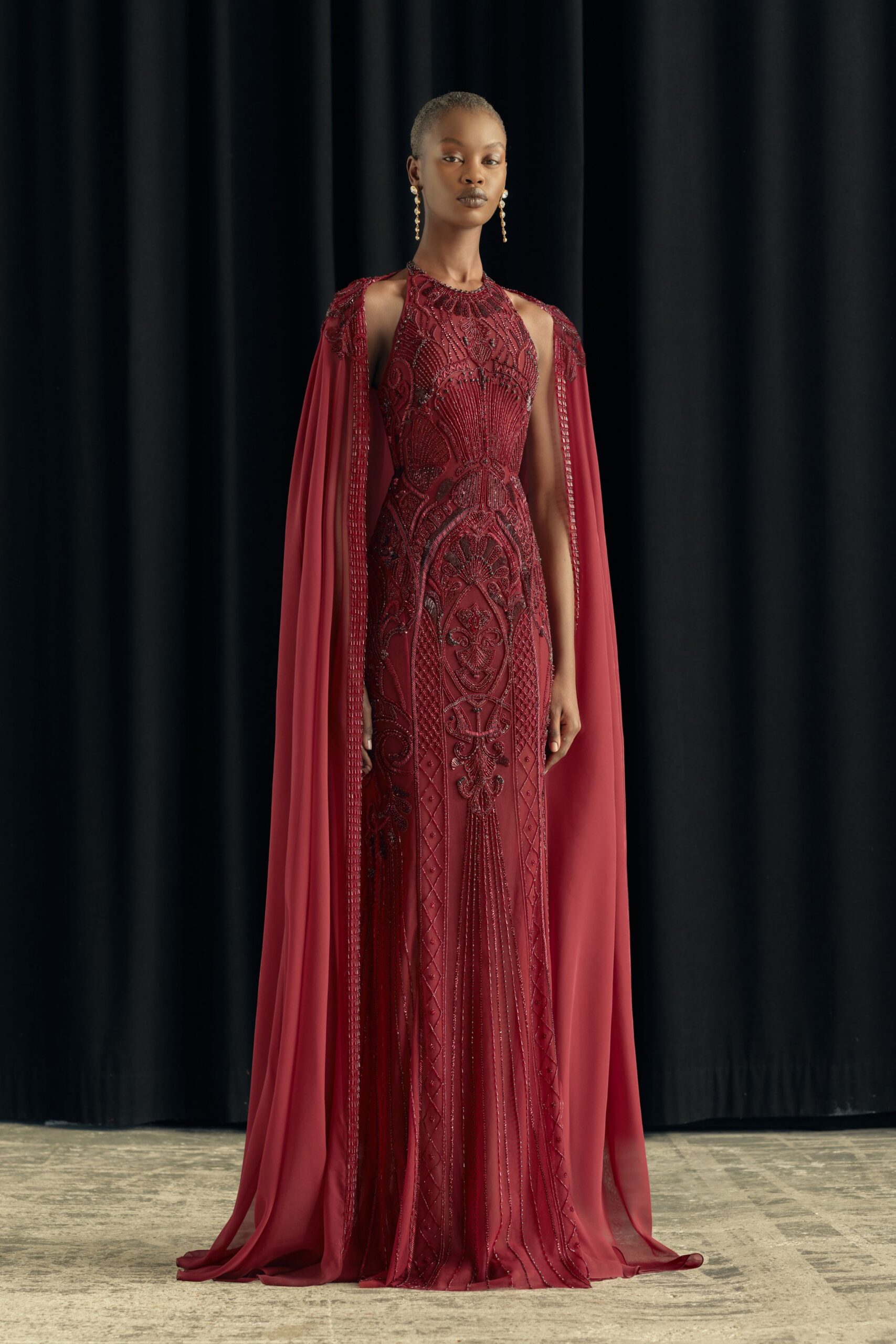 red silk sleeveless high-neck fitted embroidered draped gown