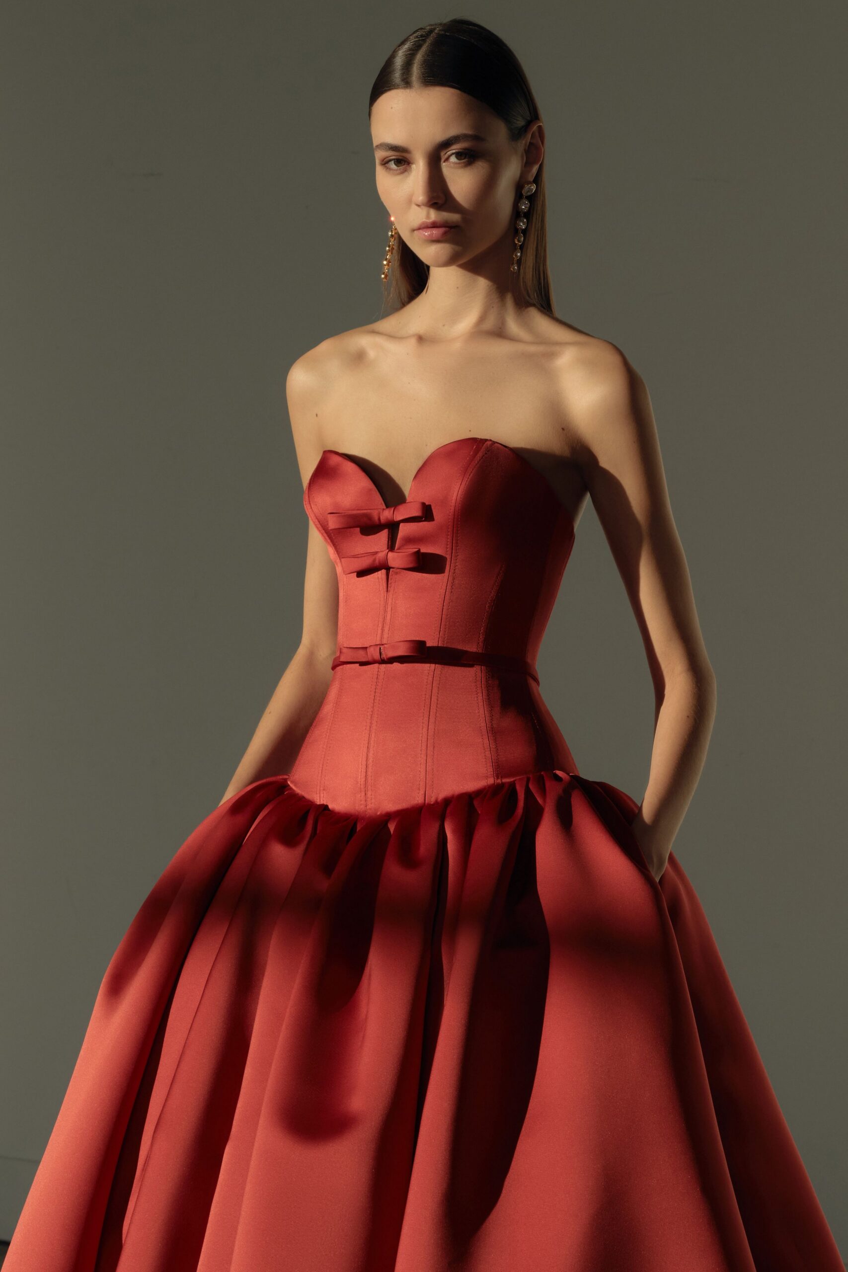 red silk strapless gown
