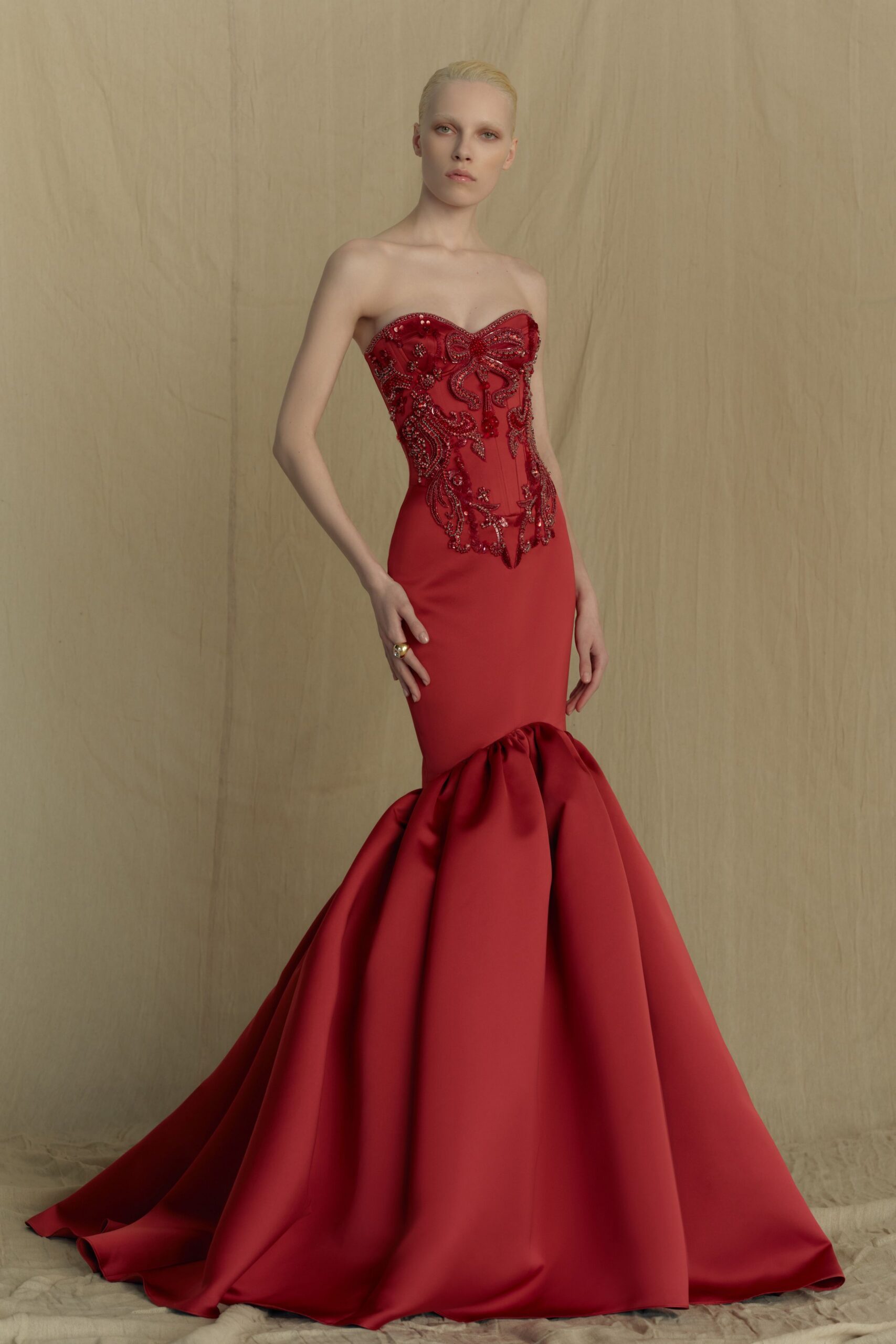 red strapless beaded gown