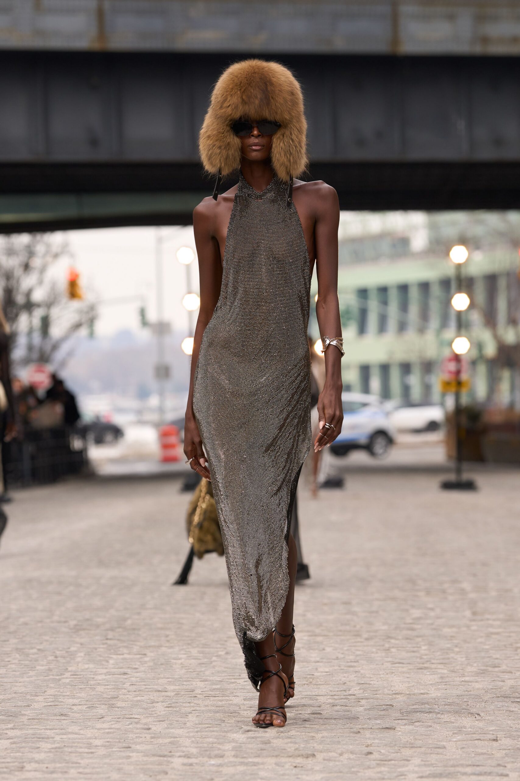 brown silk sleeveless high-neck fitted draped flowing dress