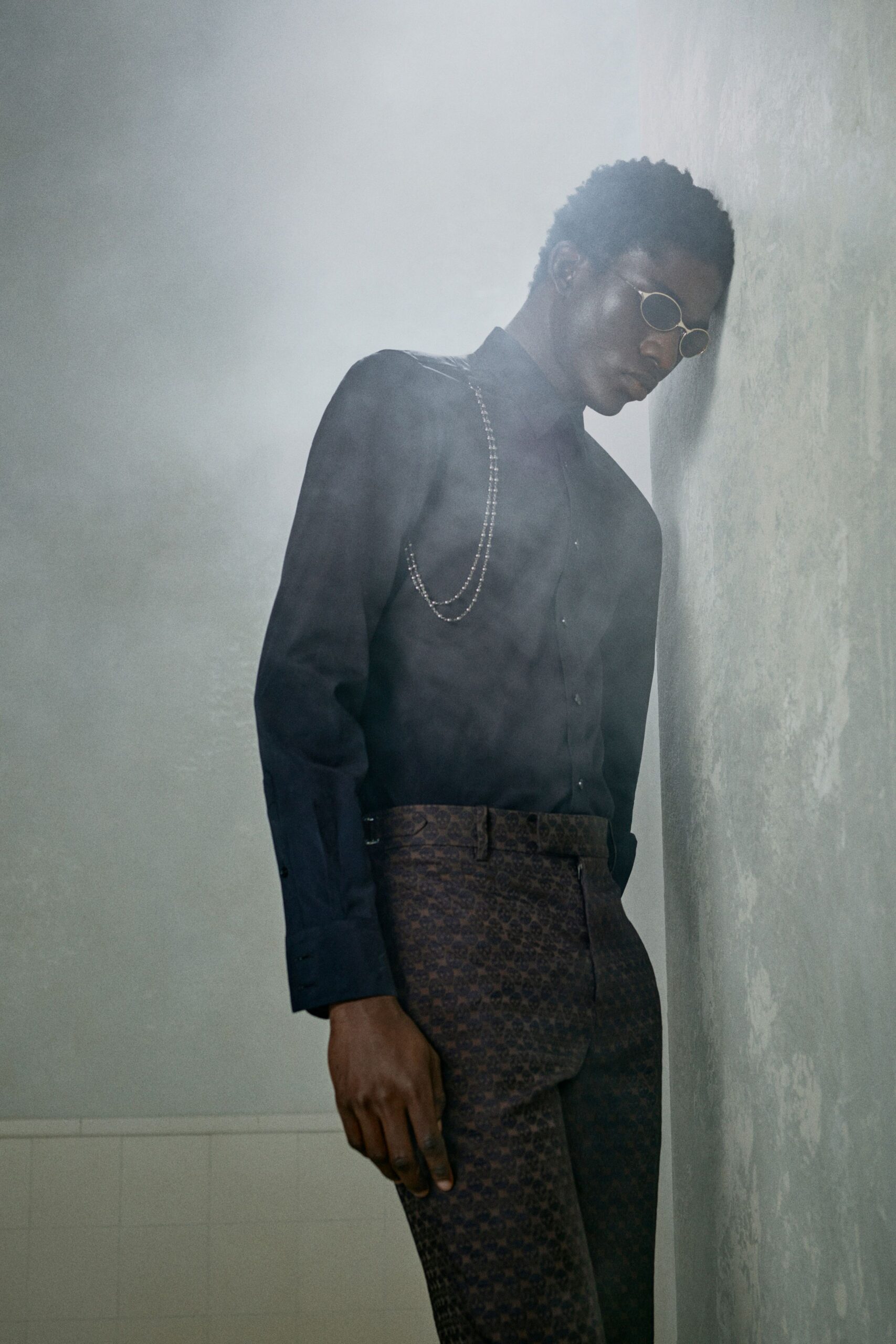 black fitted shirt with printed pants