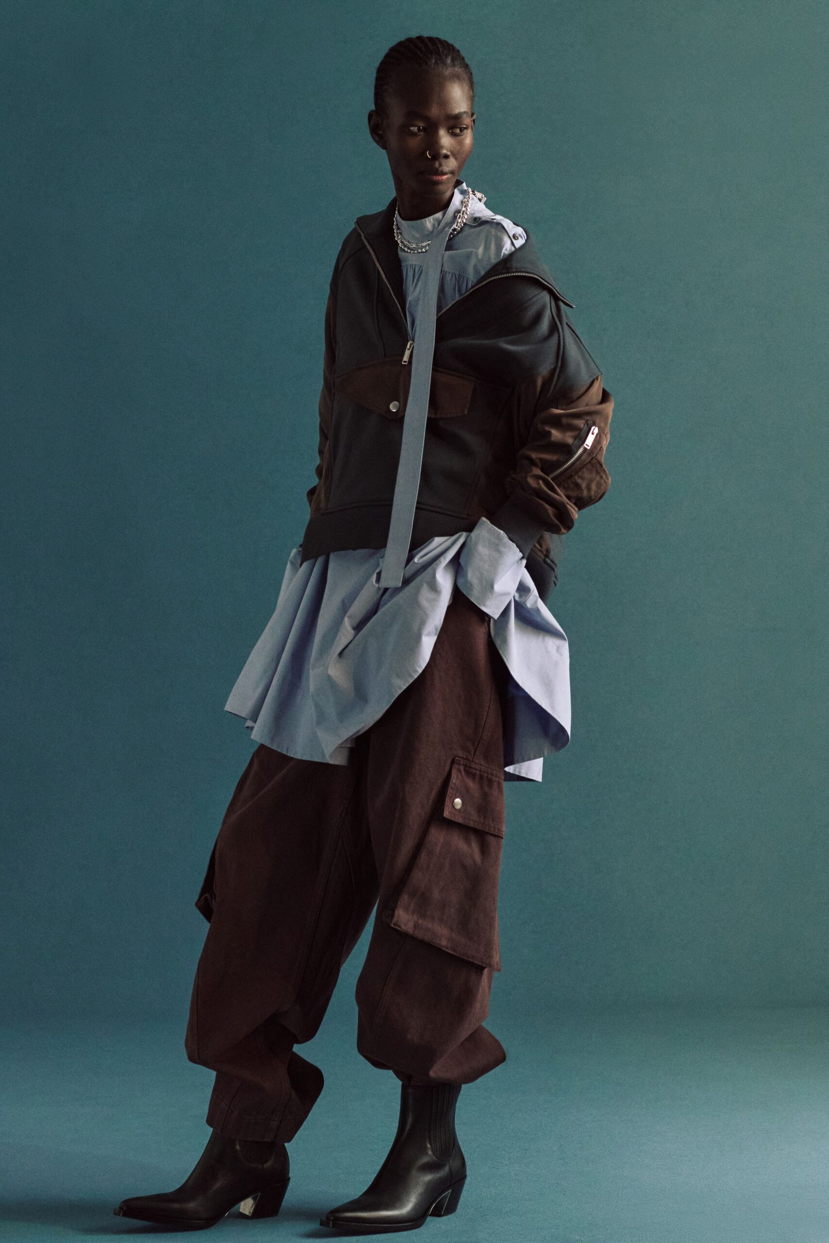 black hoodie blue shirt brown cargo pants