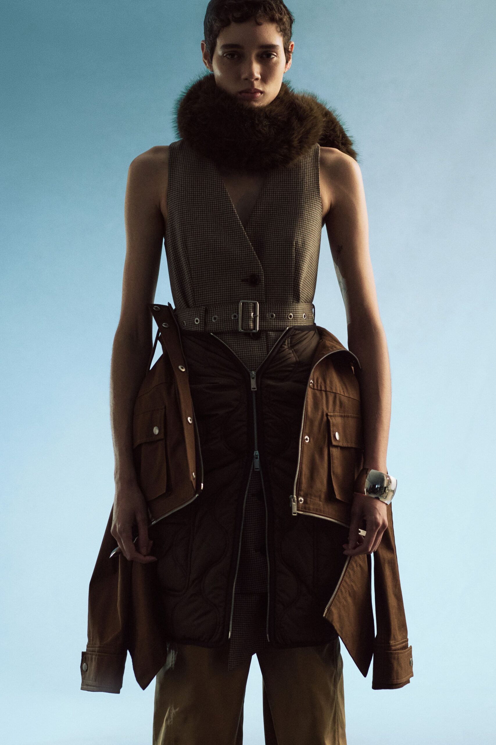 brown jacket gray vest fur scarf