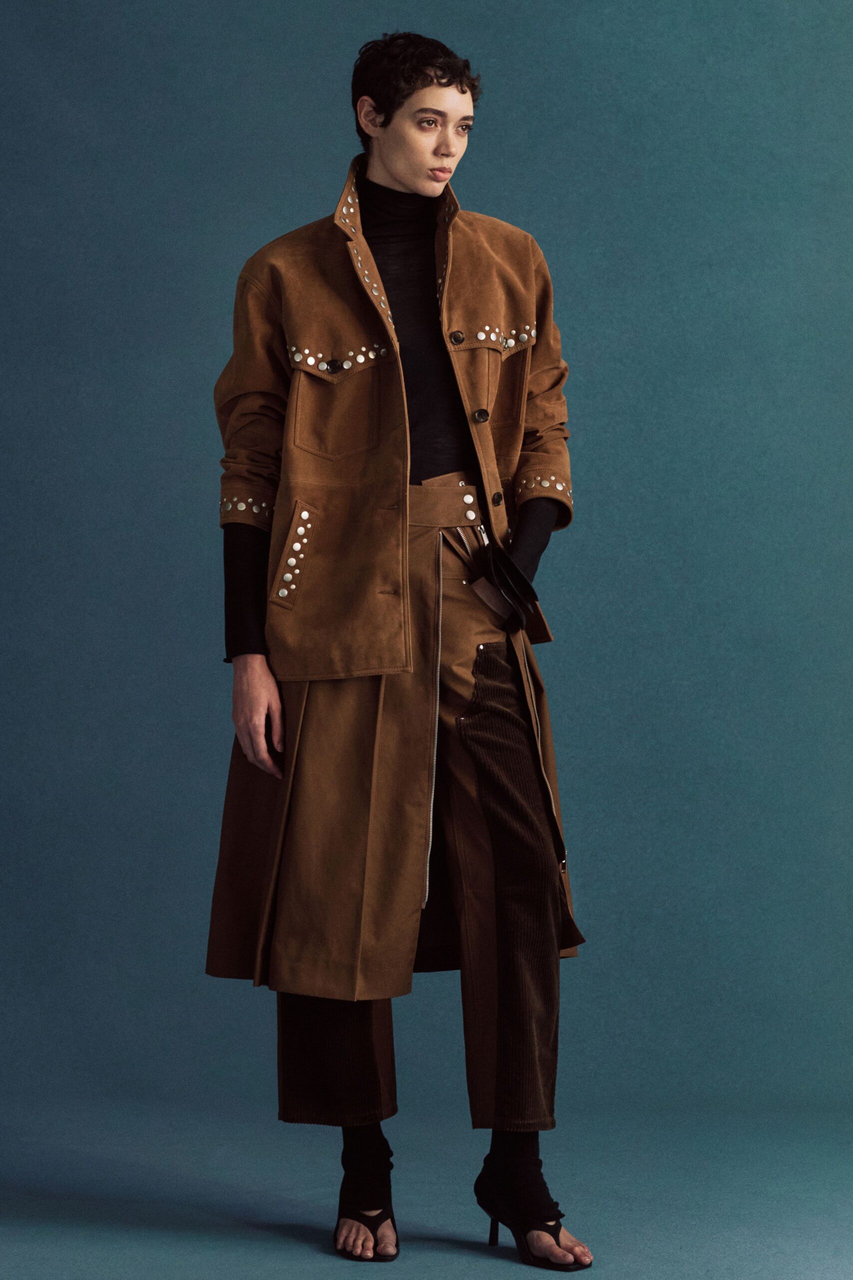 brown coat black turtleneck outfit