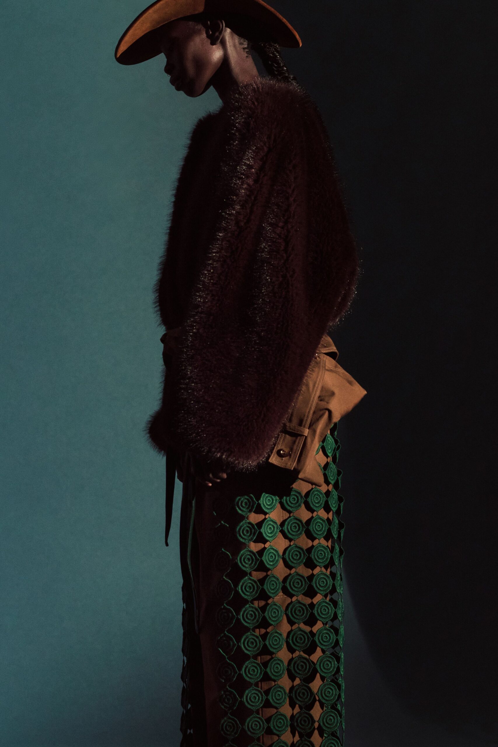 brown fur top green skirt