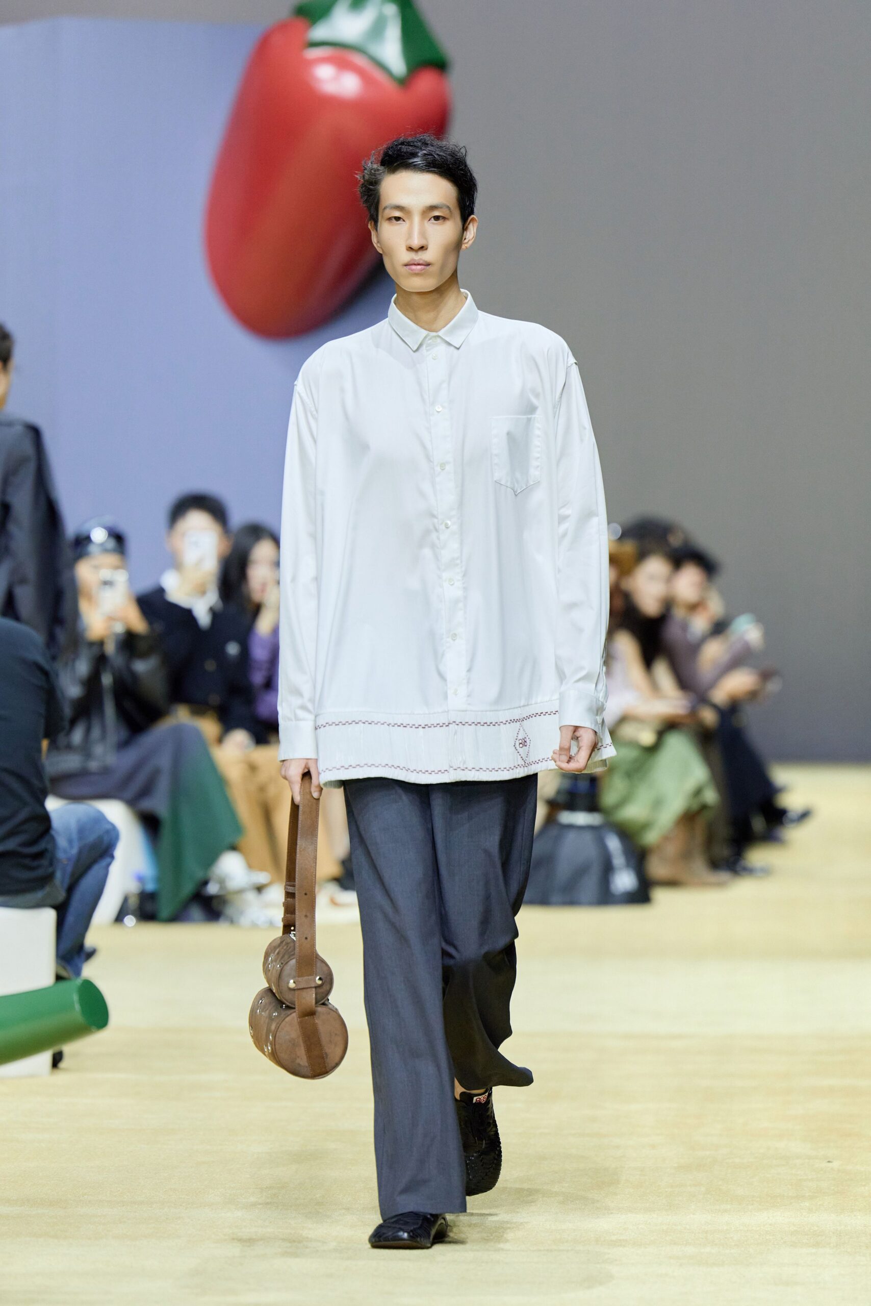 white relaxed shirt with gray pants