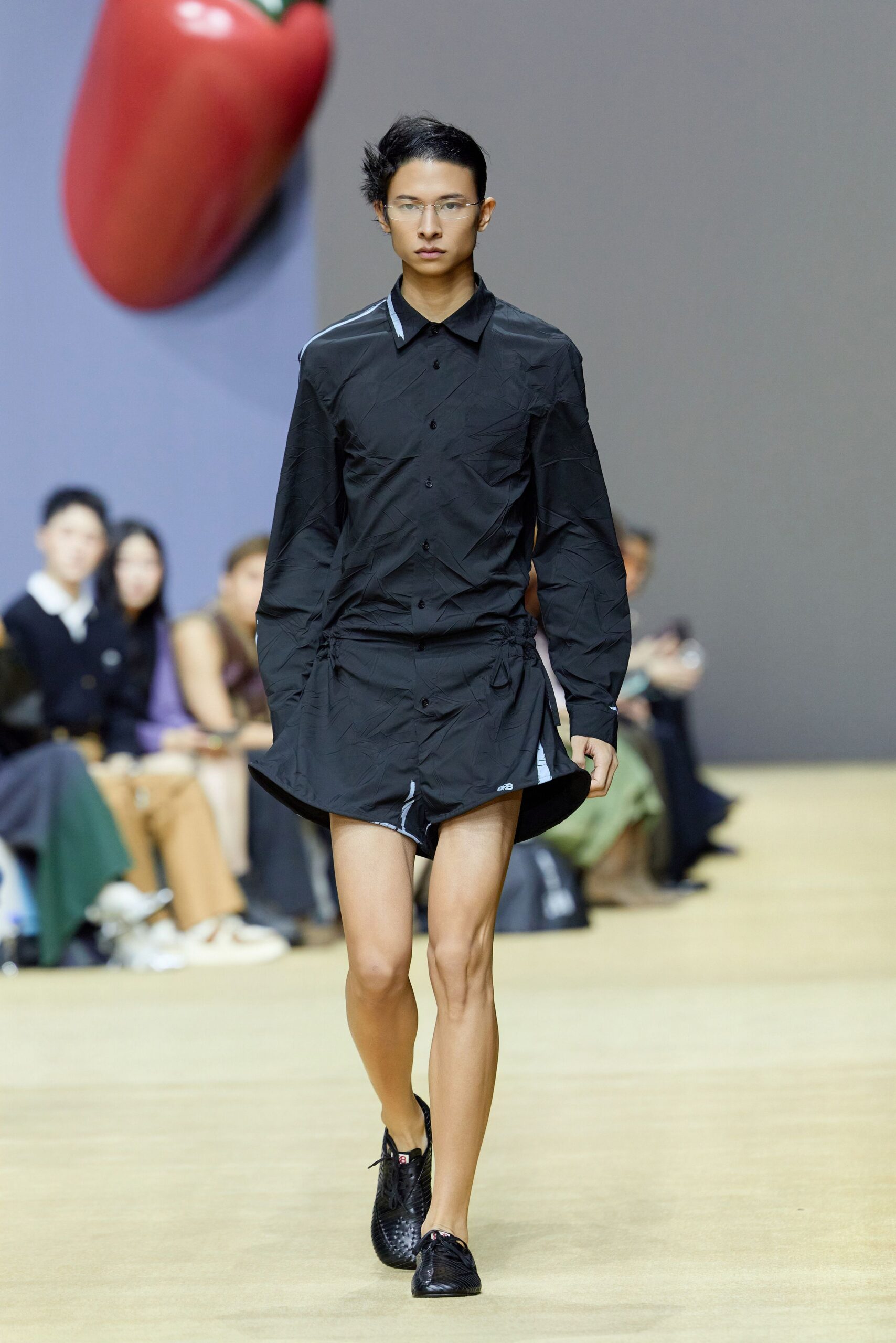 black fitted shirt and shorts