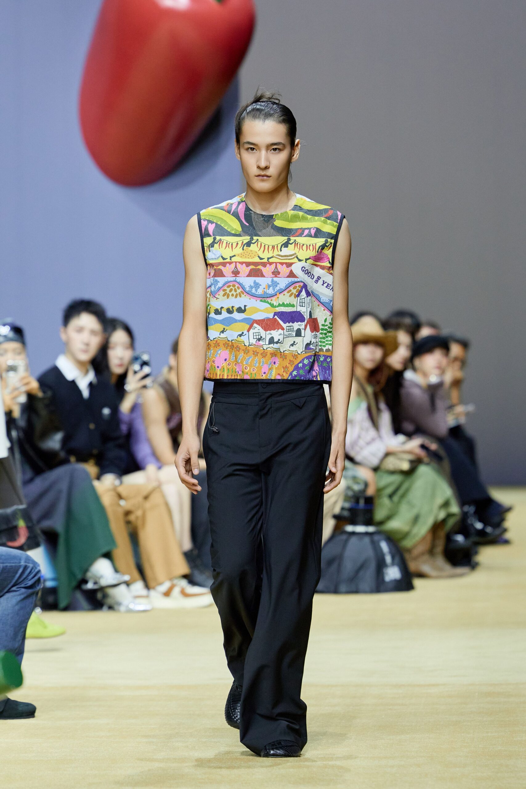 multi-colored tank-top with black pants