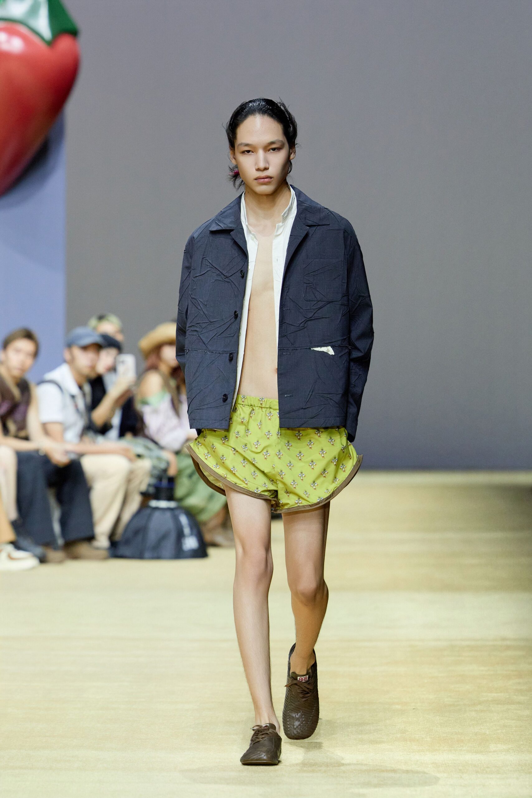 black jacket white shirt green skirt