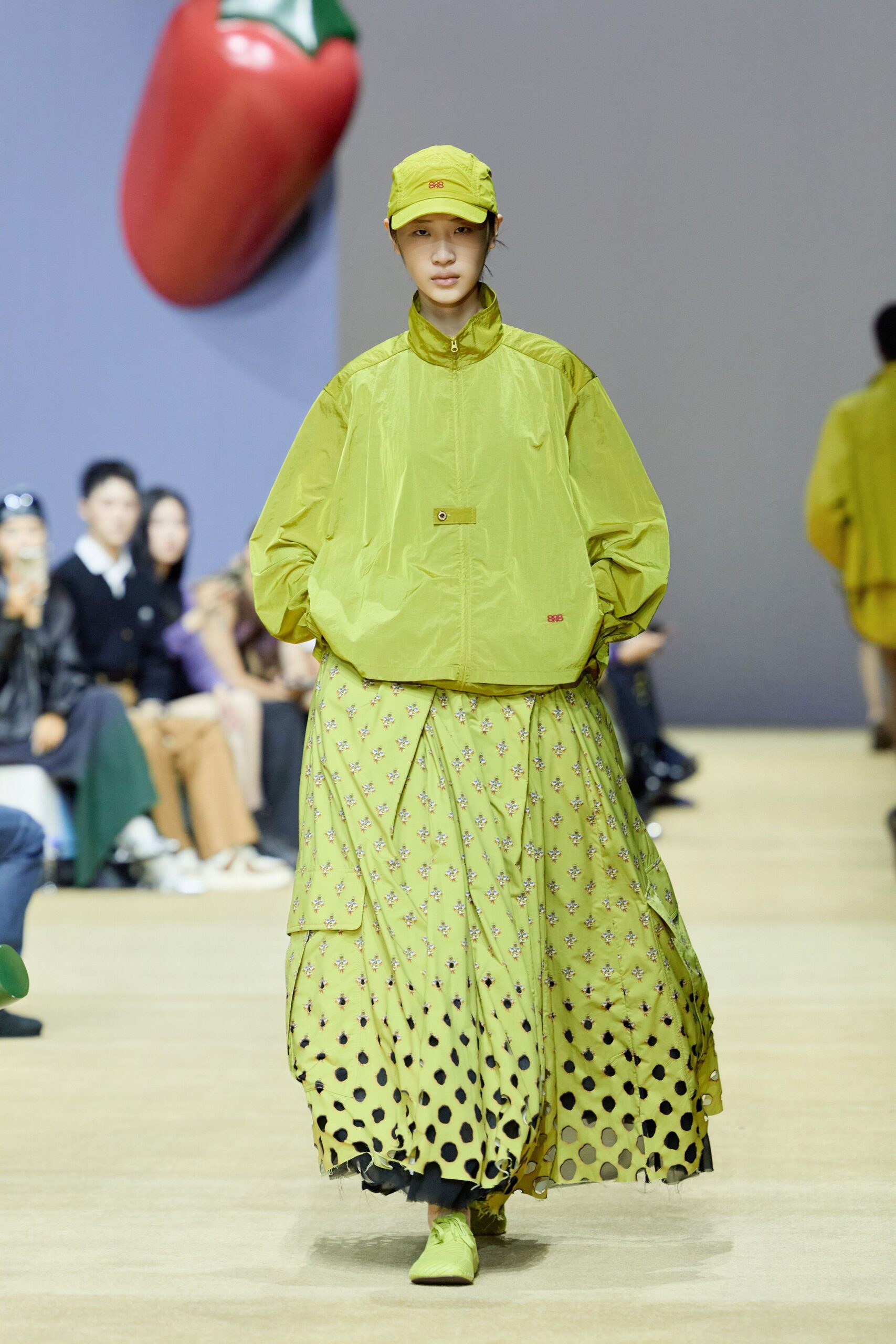 green jacket and skirt ensemble