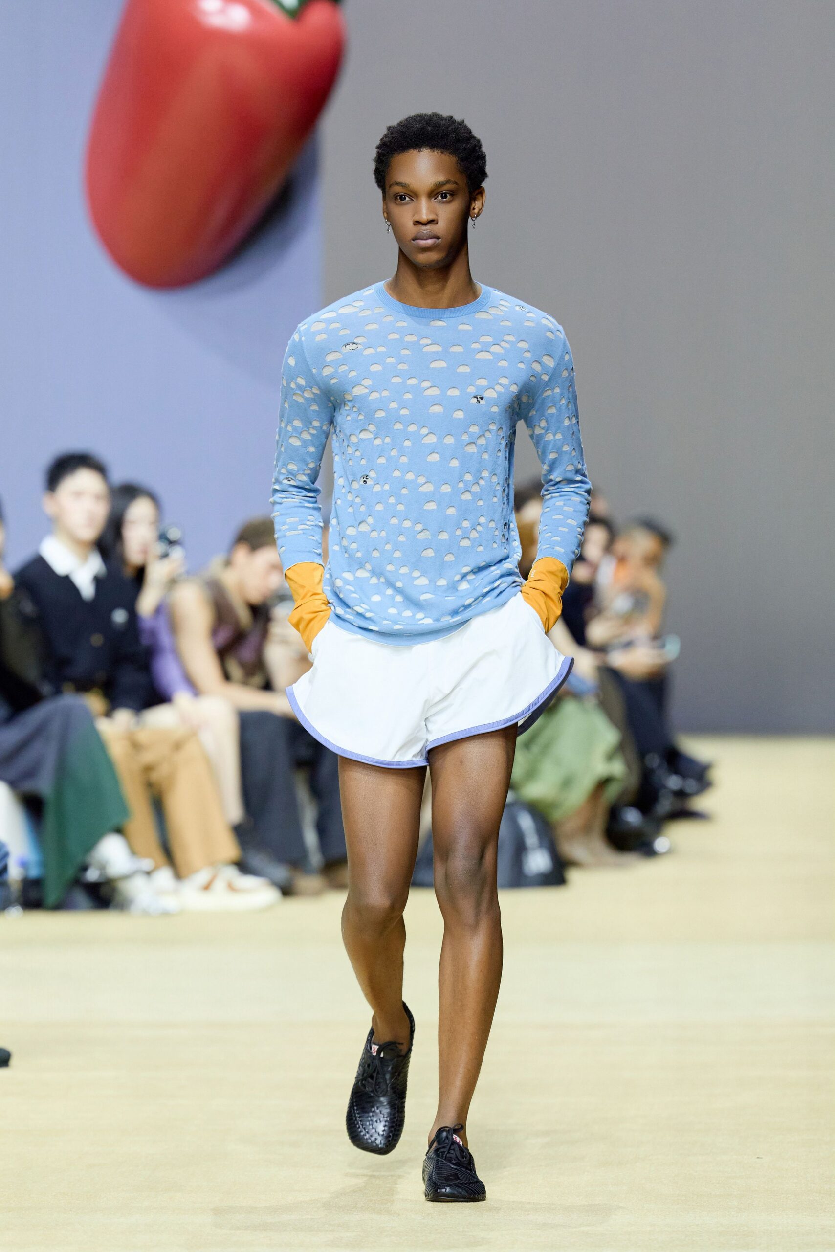 blue printed shirt with white shorts