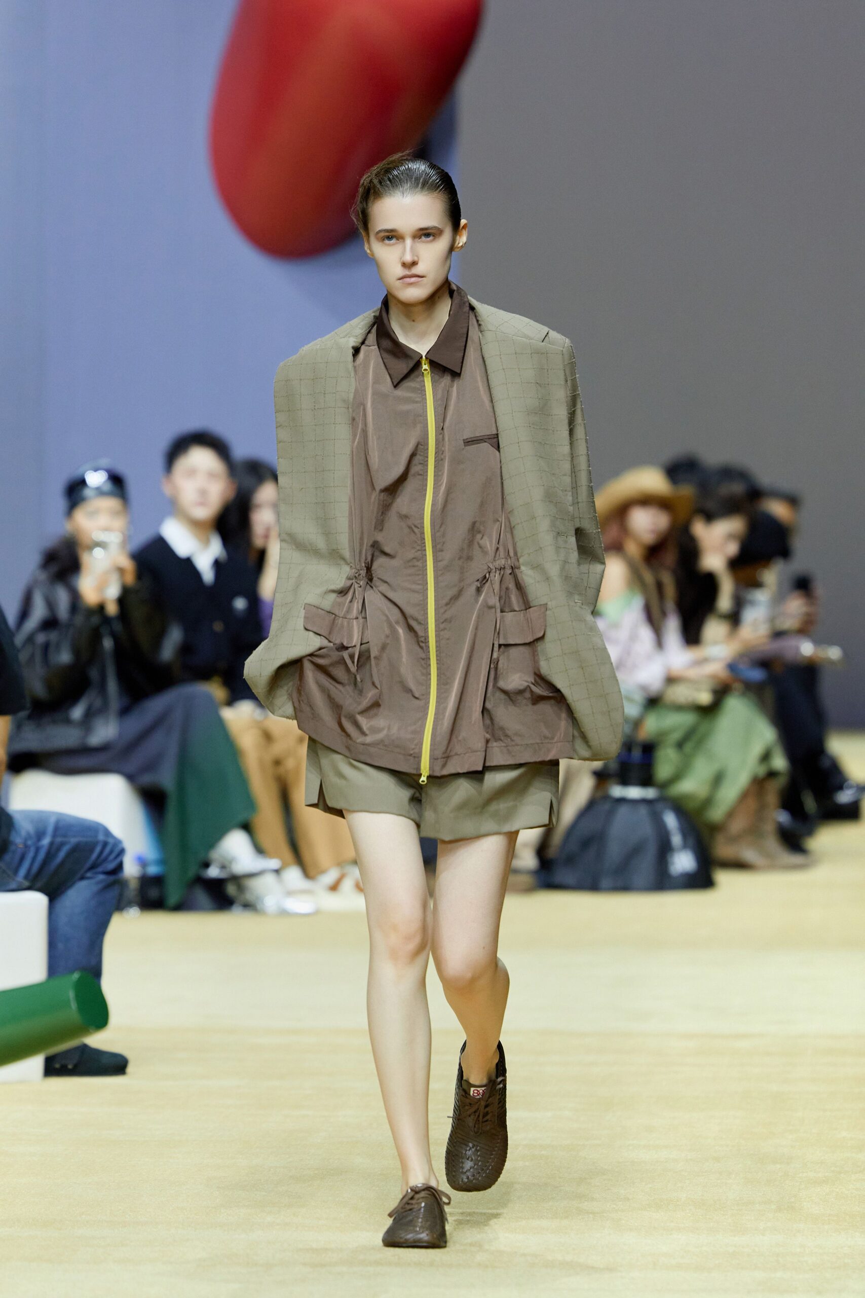 beige jacket brown shirt and shorts