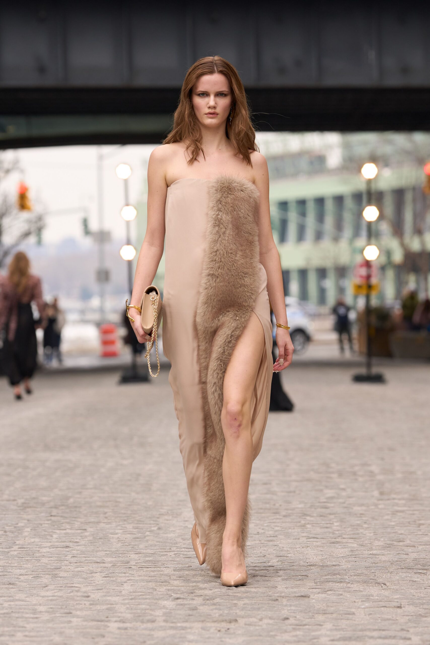 beige silk gown with fur detail