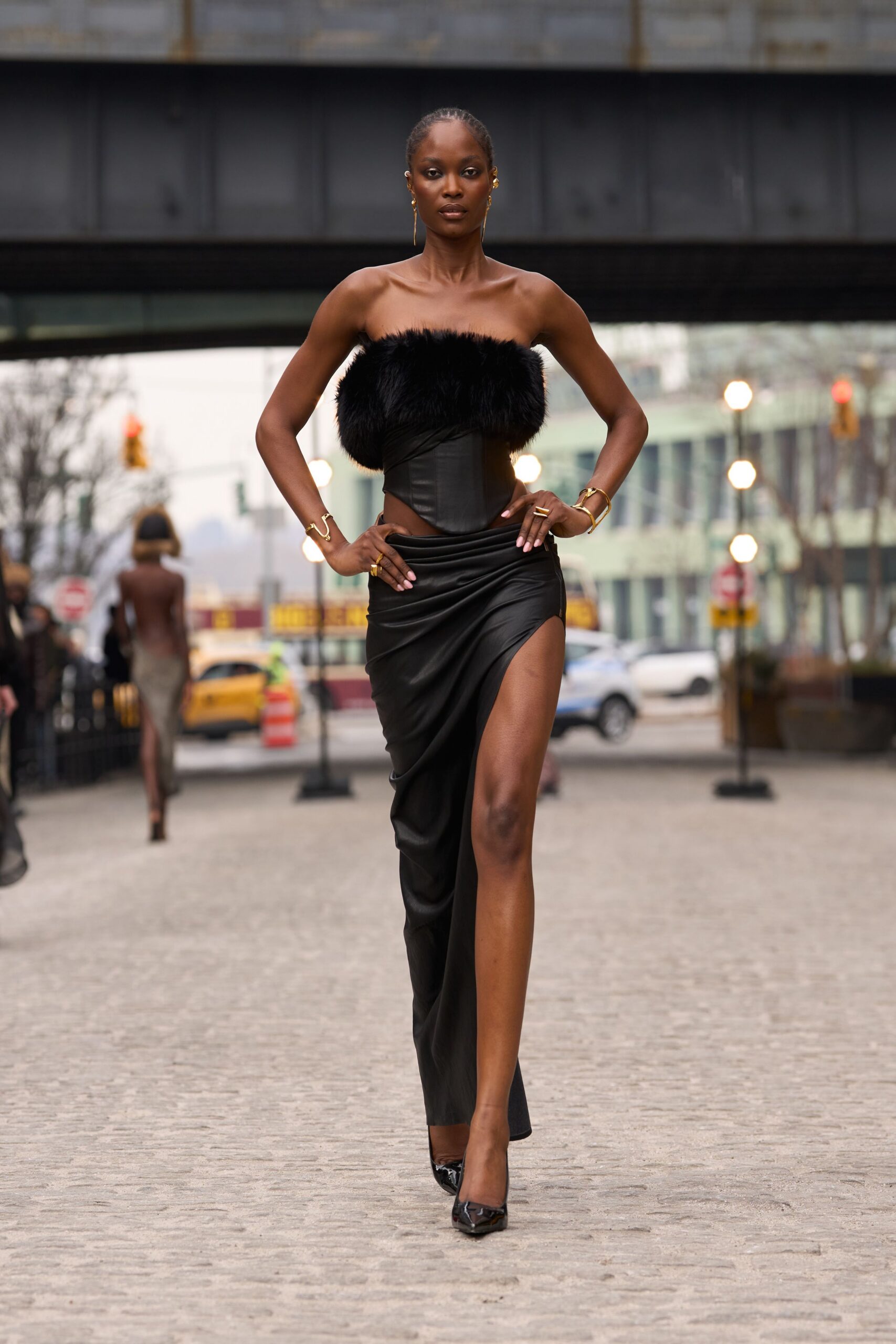 black leather strapless slit fitted ruched midi dress