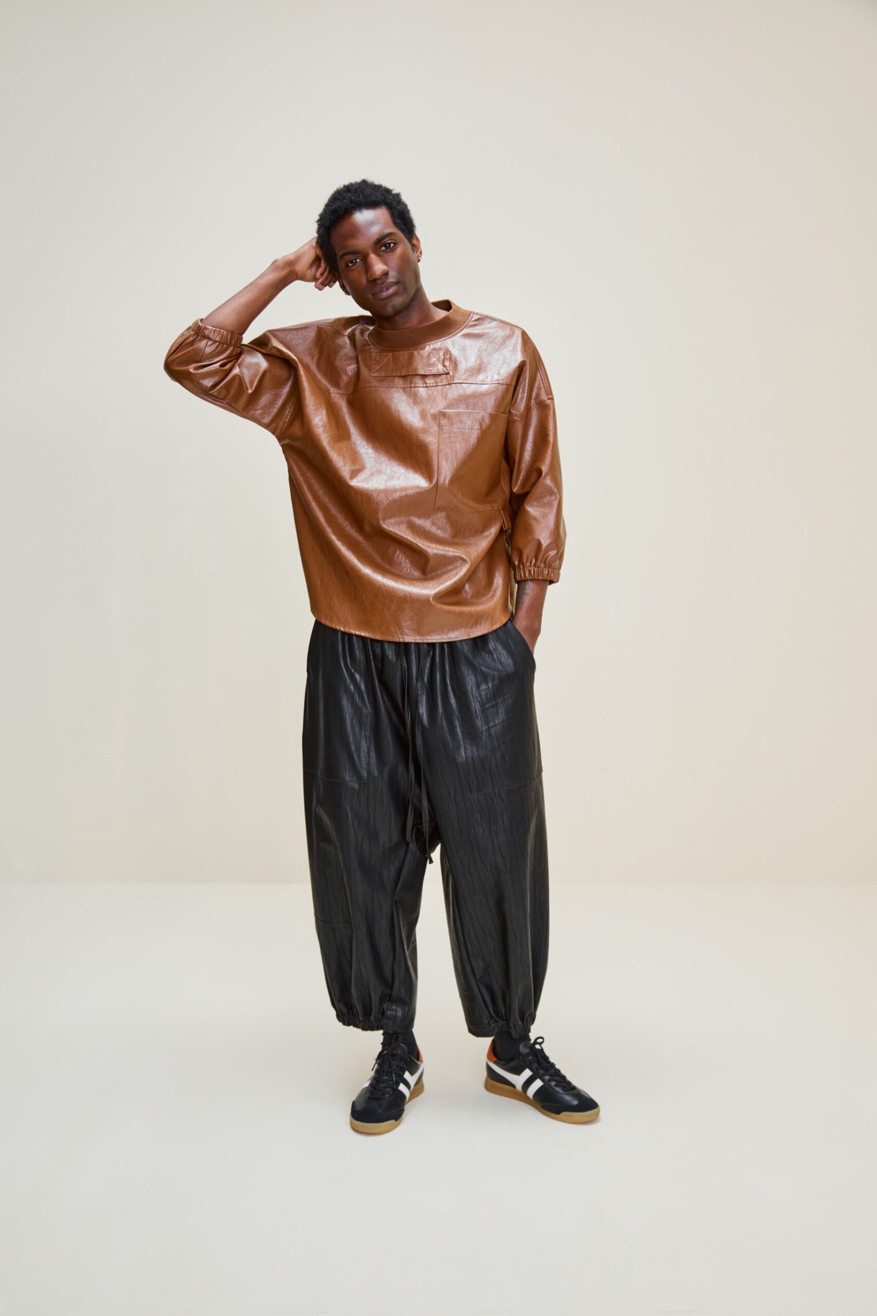 brown vinyl long-sleeve collared relaxed pleated shiny top