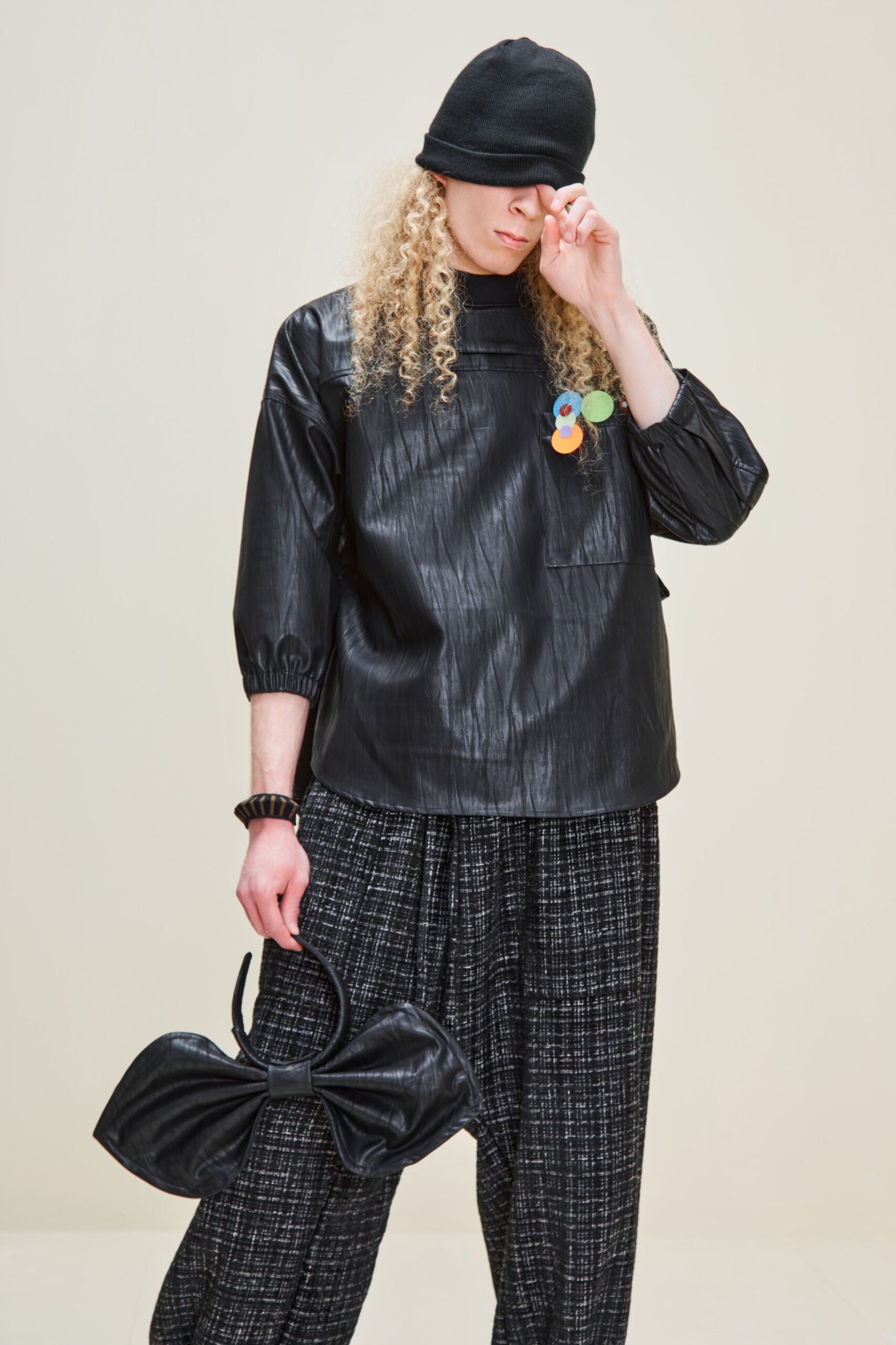 black vinyl long-sleeve high-neck relaxed pleated top