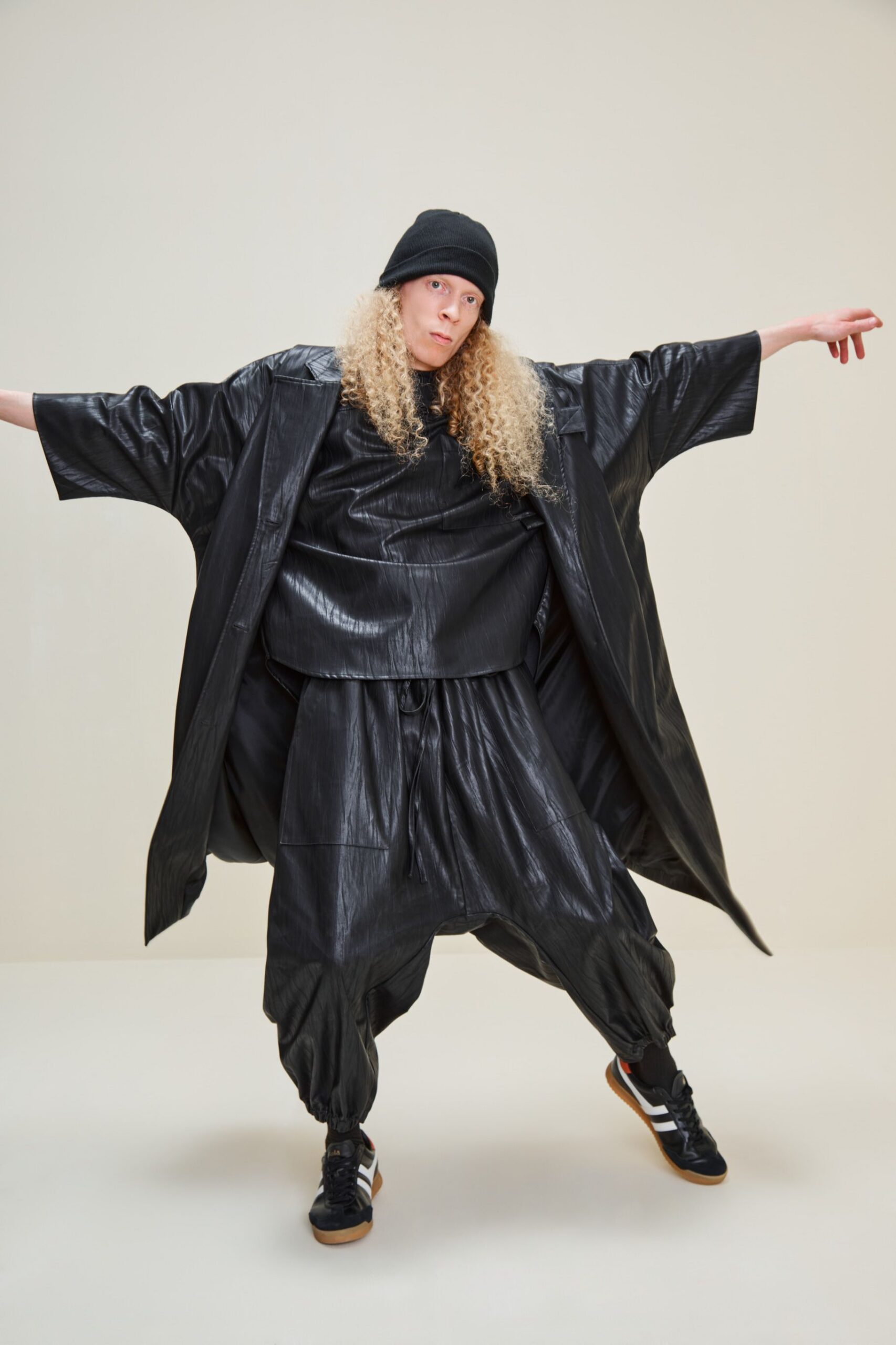 black leather long-sleeve relaxed layered coat