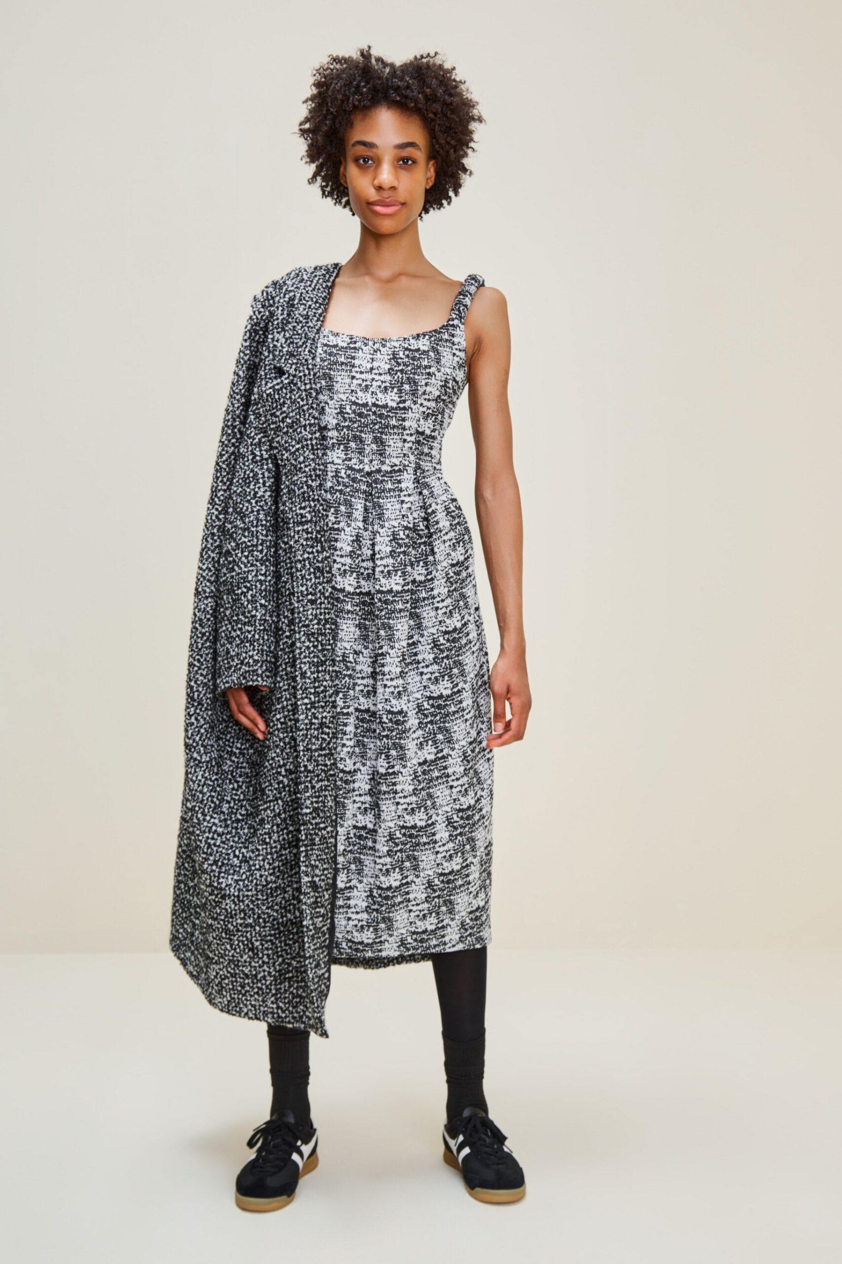 black cotton long-sleeve relaxed layered coat