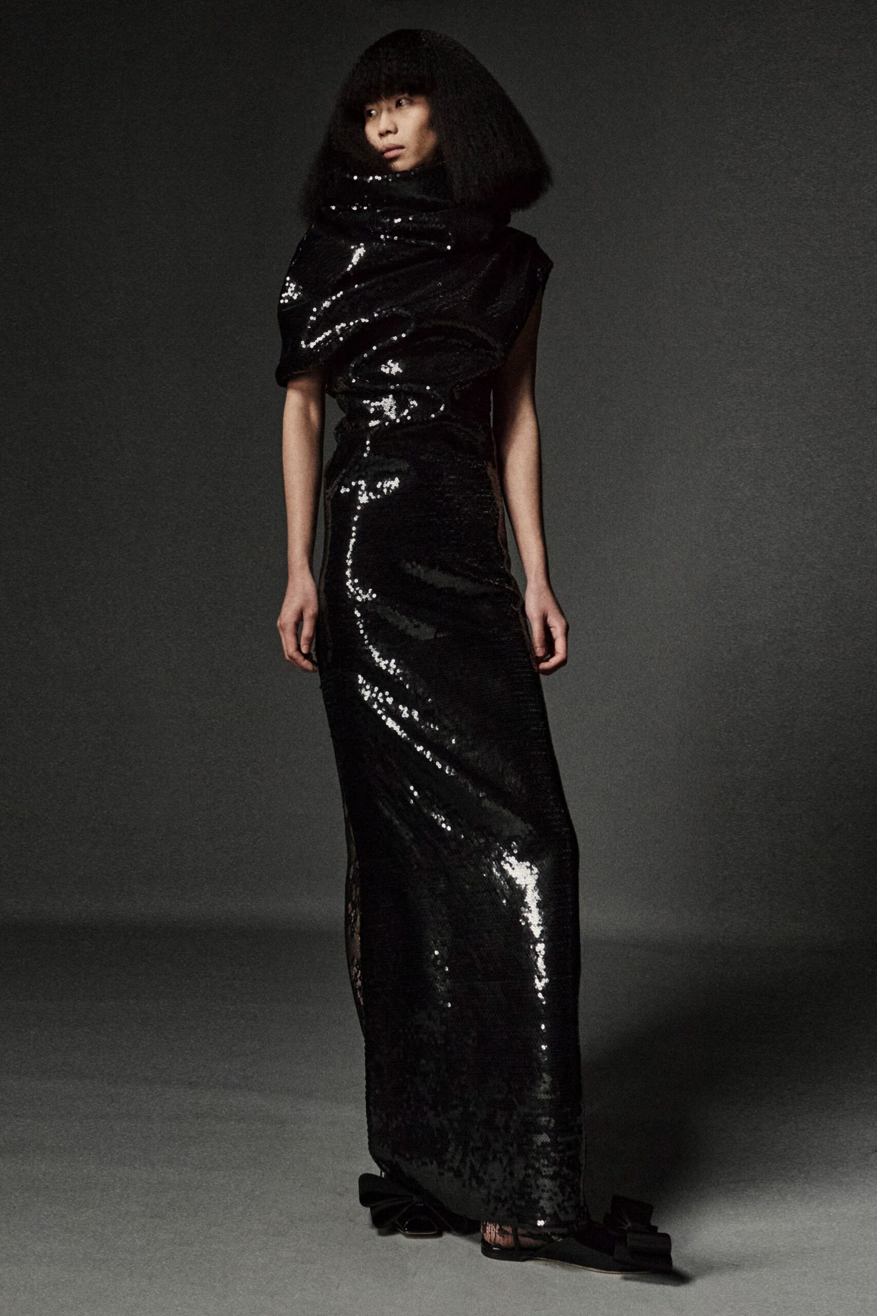 black sequin fitted gown