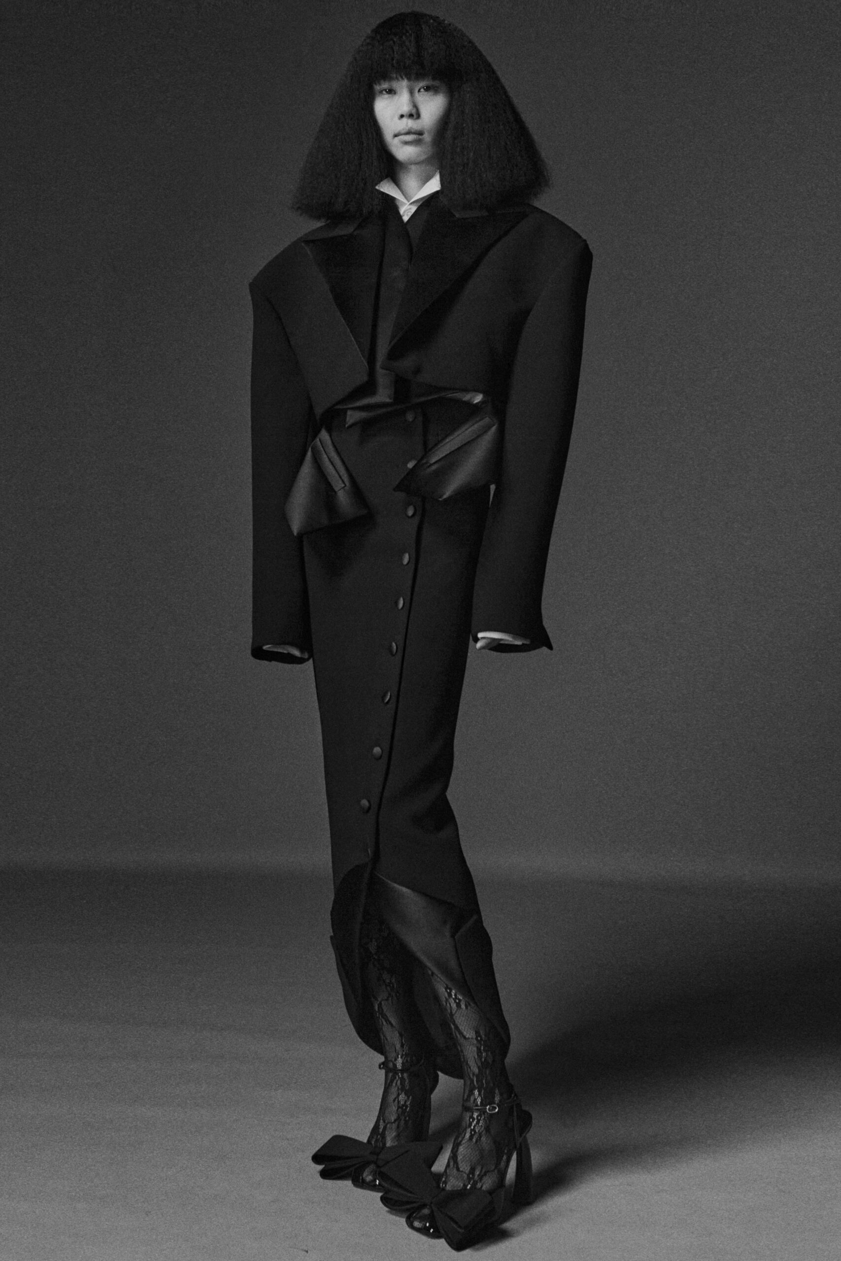 black wool long-sleeve collared fitted buttoned flared dress